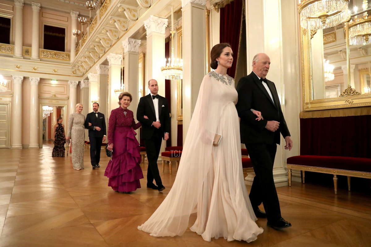 Catherine, Duchess of Cambridge (second right) is escorted into dinner by King Harald V of Norway and Prince William, Duke of Cambridge (C) is escorted by Queen Sonja of Norway at the Royal Palace on day 3 of their visit to Sweden and Norway on February 1, 2018 in Oslo, Norway