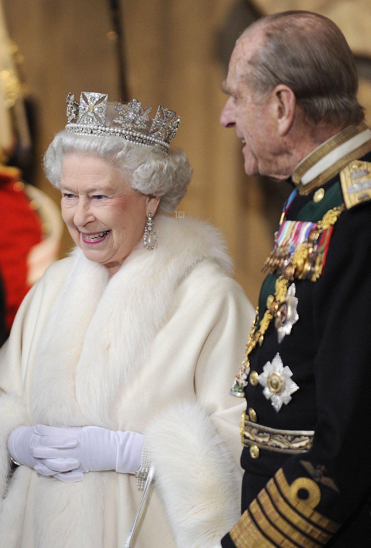 Britain's Queen Elizabeth II (L) and Prince Philip leave the Palace of Westminster following the State Opening of Parliament in London, on December 3, 2008.