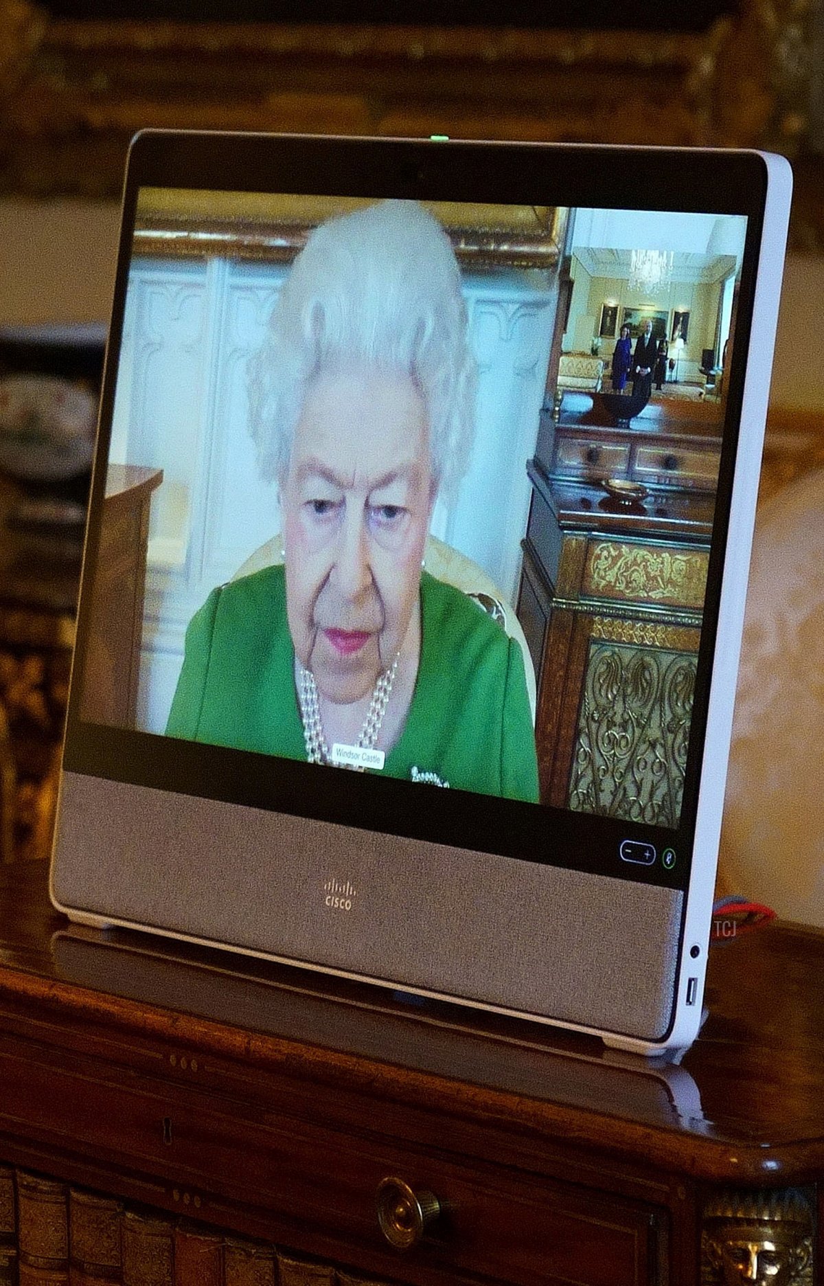 Britain's Queen Elizabeth II appears on a screen via videolink from Windsor Castle, during a virtual audience to receive the Andorra's ambassador to the United Kingdom, Carles Jordana Madero (unseen), at Buckingham Palace in London on March 1, 2022