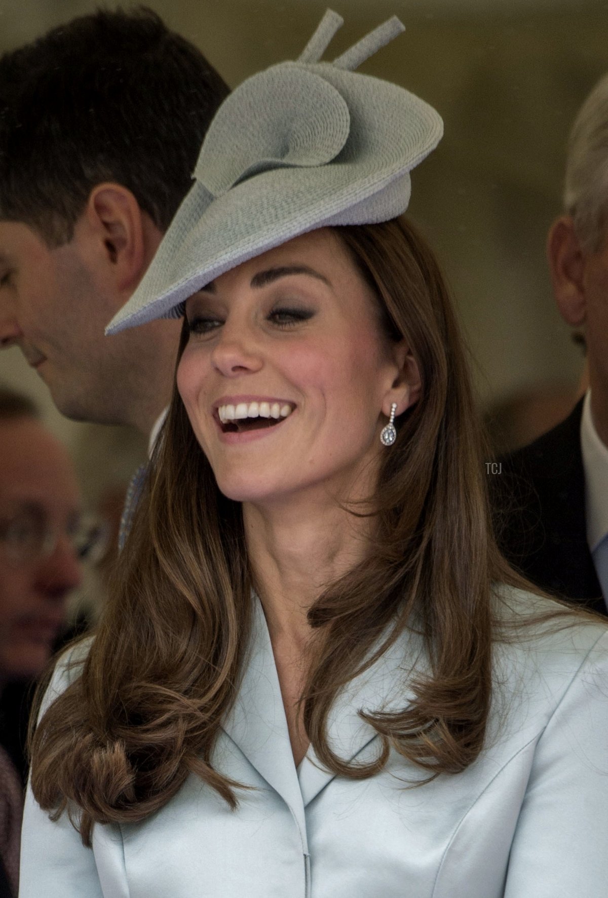 Britain's Catherine, The Duchess of Cambridge watches a procession ahead of the Most Noble Order of the Garter Ceremony on June 16, 2014 in Windsor, England