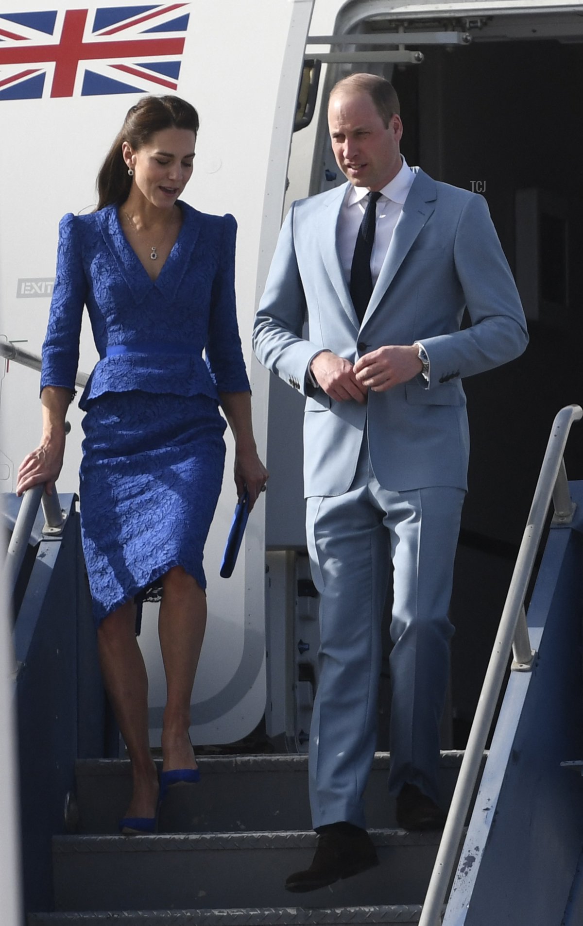Britain's Prince William, Duke of Cambridge, and Britain's Catherine, Duchess of Cambridge, arrive at Belize City's International Airport on March 19, 2022, at the start of their Caribbean tour