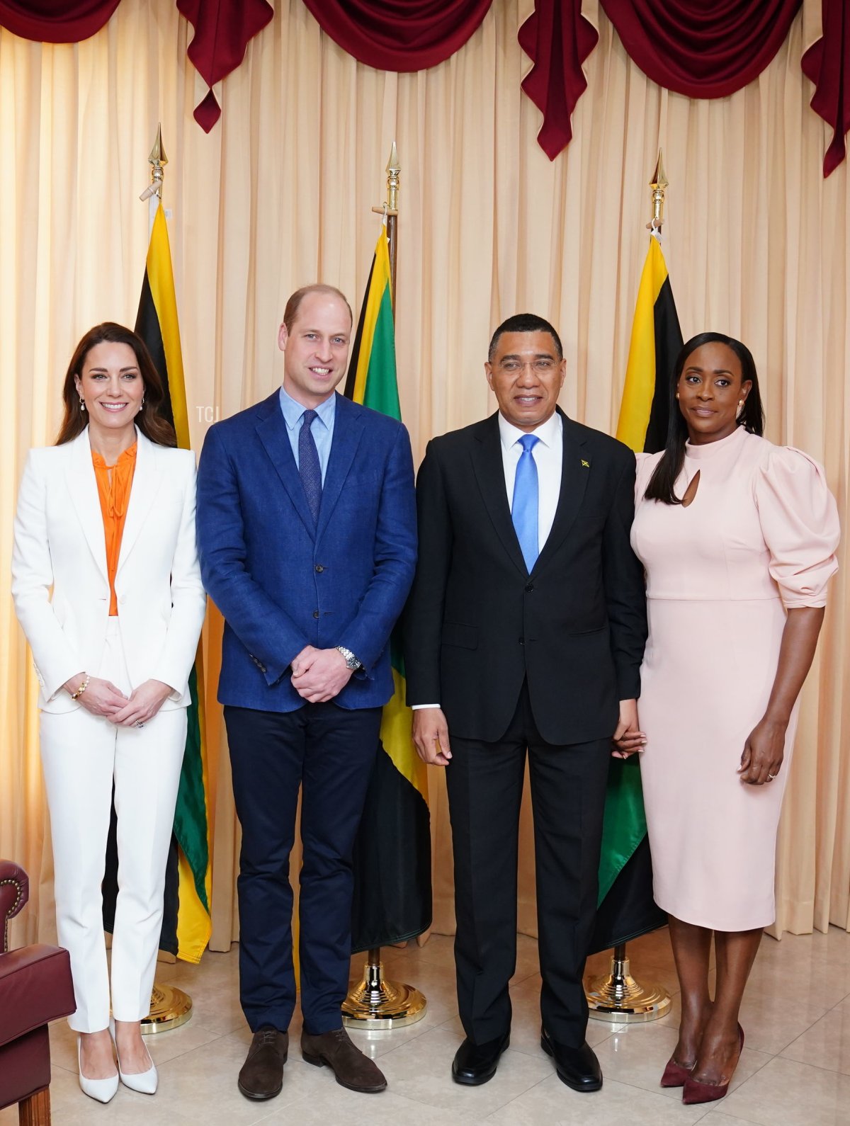 Prince William, Duke of Cambridge (2nd L) and Catherine, Duchess of Cambridge (L) pose for a photograph with the Prime Minister of Jamaica, Andrew Holness (2nd R) and his wife Juliet (R) during a meeting at his office on March 23, 2022 in Kingston, Jamaica
