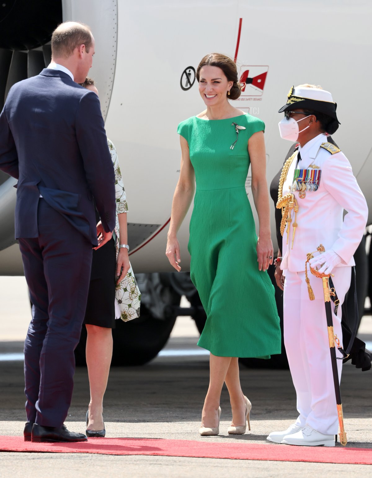 Prince William, Duke of Cambridge and Catherine, Duchess of Cambridge speak to dignitaries ahead of their departure on RAF Voyager from Norman Manley International Airport on day six of the Platinum Jubilee Royal Tour of the Caribbean on March 24, 2022 in Kingston, Jamaica