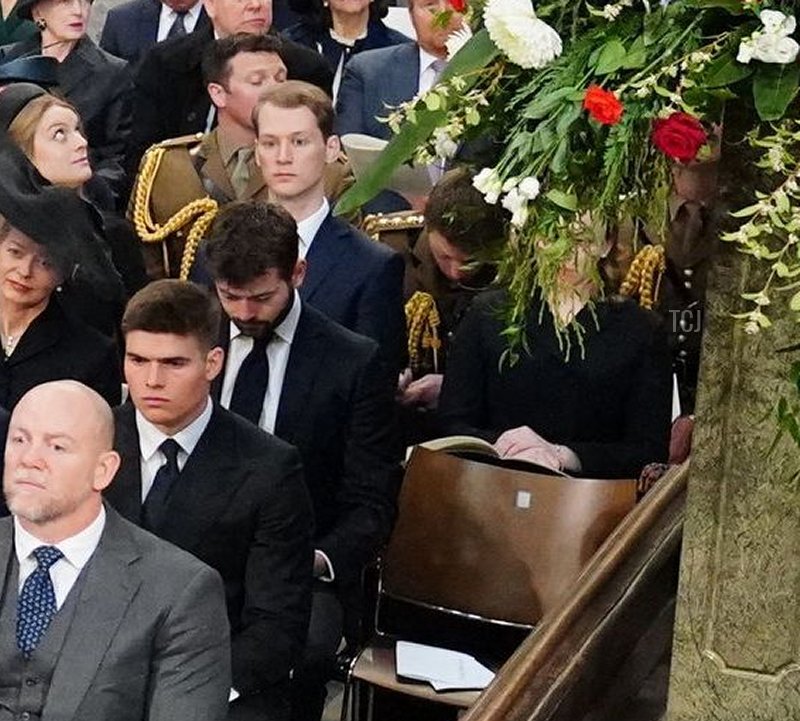 Britain's Queen Elizabeth II (L), and front row (L to R) Britain's Prince Charles, Prince of Wales, Britain's Camilla, Duchess of Cornwall, Britain's Princess Anne, Princess Royal, and Vice Admiral Timothy Laurence, Britain's Prince Andrew, Duke of York, Britain's Prince Edward, Earl of Wessex, Britain's Sophie, Countess of Wessex, Britain's Lady Louise Windsor and Viscount James Mountbatten-Windsor, and second row (L to R) Britain's Prince William, Duke of Cambridge, Britain's Prince George of Cambridge, Britain's Princess Charlotte of Cambridge and Britain's Catherine, Duchess of Cambridge, Peter Phillips, and his daughters Savannah and Isla, Mia Grace Tindal and her parents Zara Phillips amd Mike Tindall, attend a Service of Thanksgiving for Britain's Prince Philip, Duke of Edinburgh, at Westminster Abbey in central London on March 29, 2022