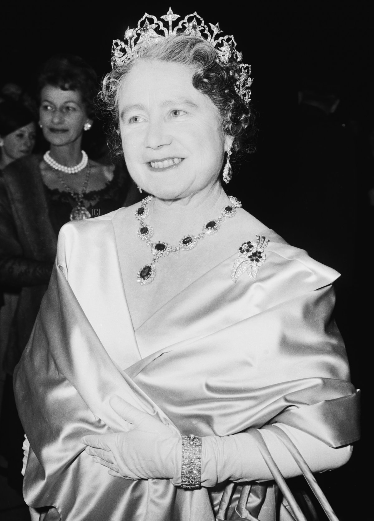 The Queen Mother (1900 - 2002) attends a performance at RADA (the Royal Academy of Dramatic Art), to celebrate the drama school's Diamond Jubilee (60th anniversary), London, UK, November 1964