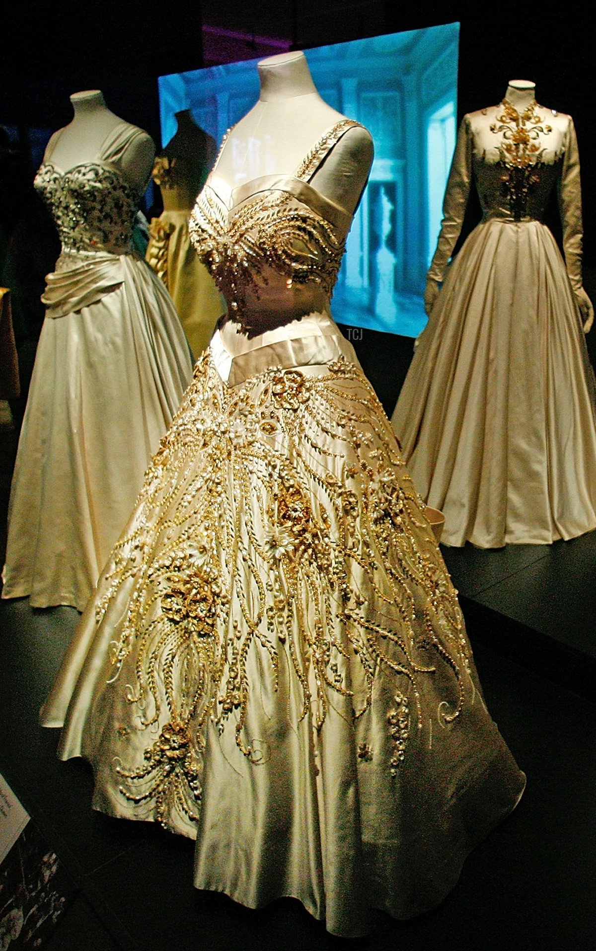 'Flowers of the Fields of France' a ceremonial gown designed for HM Queen Elizabeth II by Norman Hartnell from 1957 is displayed at the Golden Age Of Couture Exhibition at The V&A Museum on September 19, 2007 in London