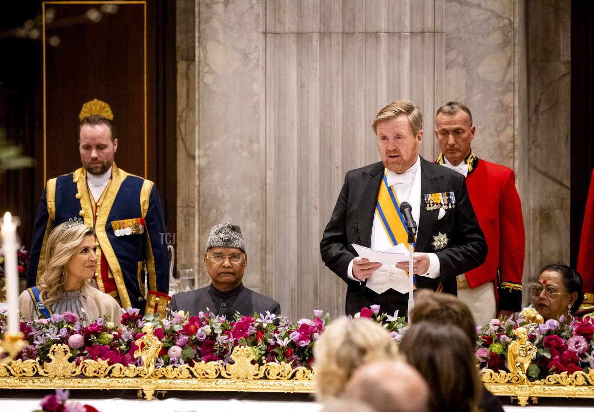 Netherland's King Willem-Alexander (2nd R) delivers a speech as Queen Maxima (L), India's President Ram Nath Kovind (2nd L) and his wife Savita Kovind (R) listen during a state banquet in the Citizens' Hall of the Royal Palace in Amsterdam on April 5, 2022, on the first day of Kovind's state visit in the Netherlands aimed at broadening the cooperation between the two countries