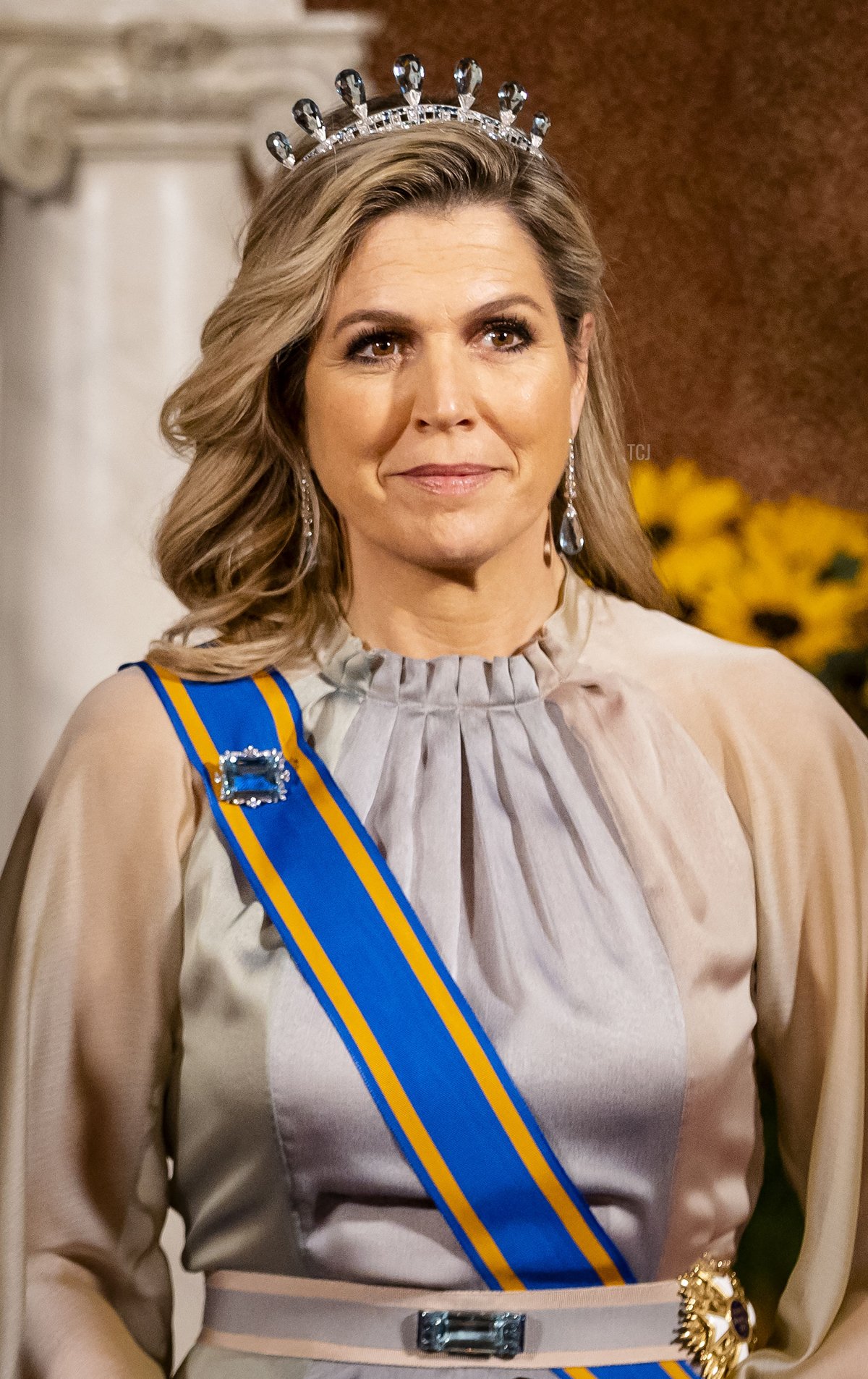 Queen Maxima poses for a photograph before a state banquet in the Citizens' Hall of the Royal Palace in Amsterdam on April 5, 2022, on the first day of India's President state visit in the Netherlands aimed at broadening the cooperation between the two countries