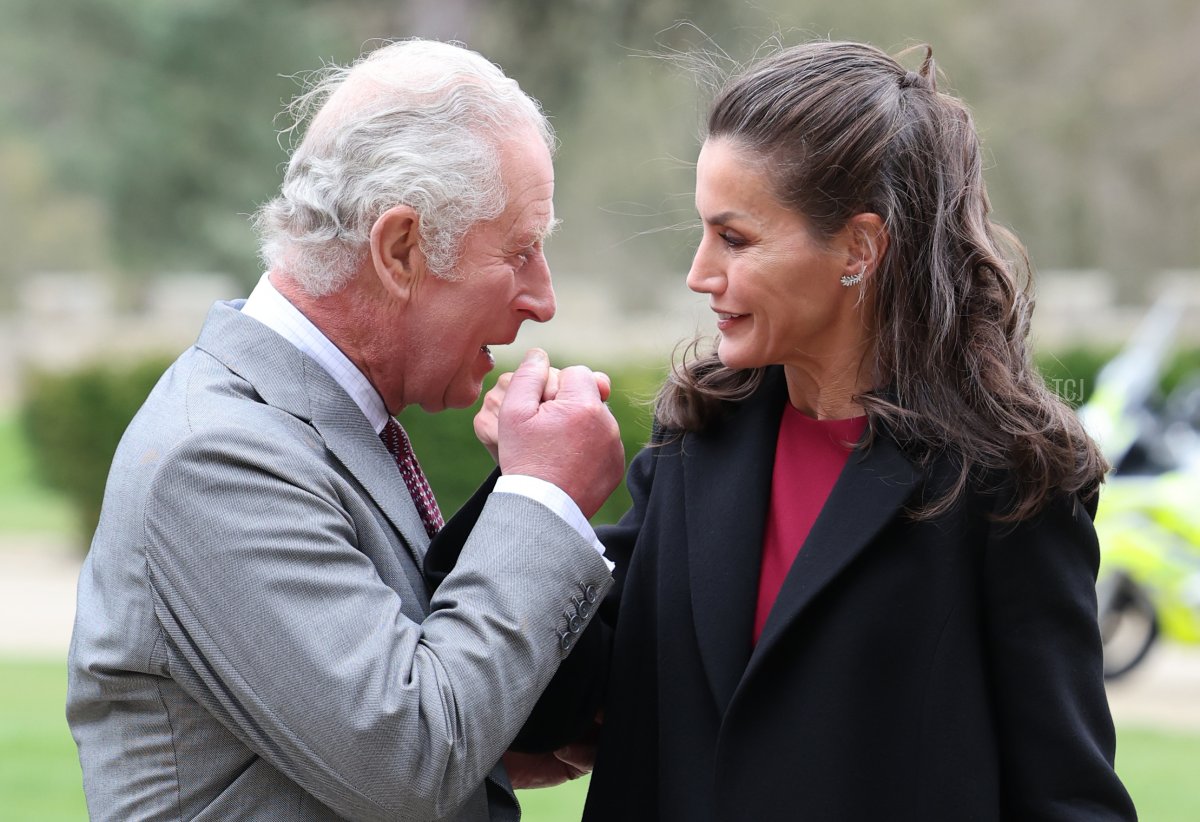 Prince Charles, Prince of Wales kisses the hand of Queen Letizia of Spain during their arrival at Auckland Castle on April 05, 2022 in Bishop Auckland, England
