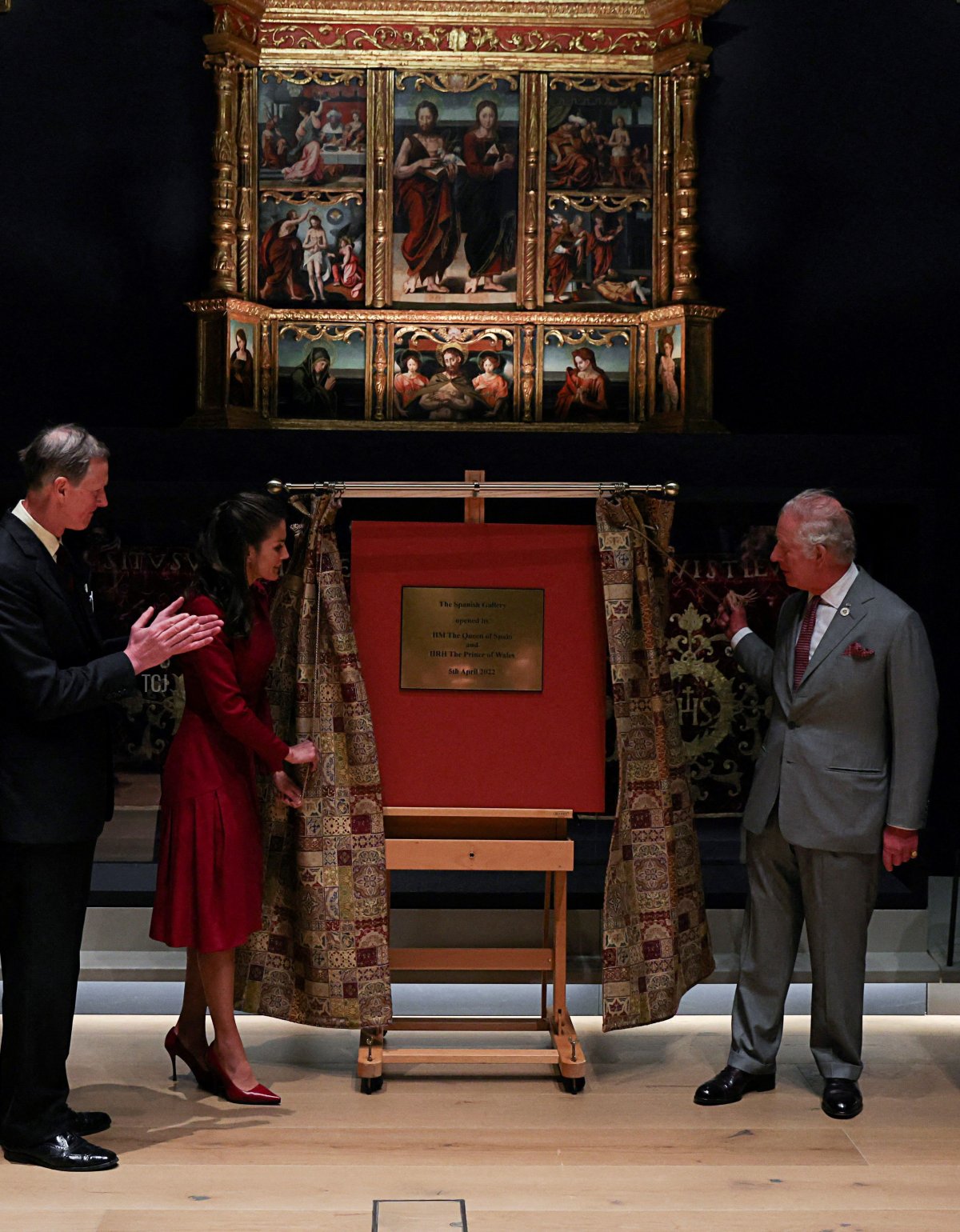 Britain's Prince Charles, Prince of Wales (3R) and Spain's Queen Letizia (4L) unveil a plaque to officially open the Spanish Gallery in Bishop Auckland, north east England on April 5, 2022
