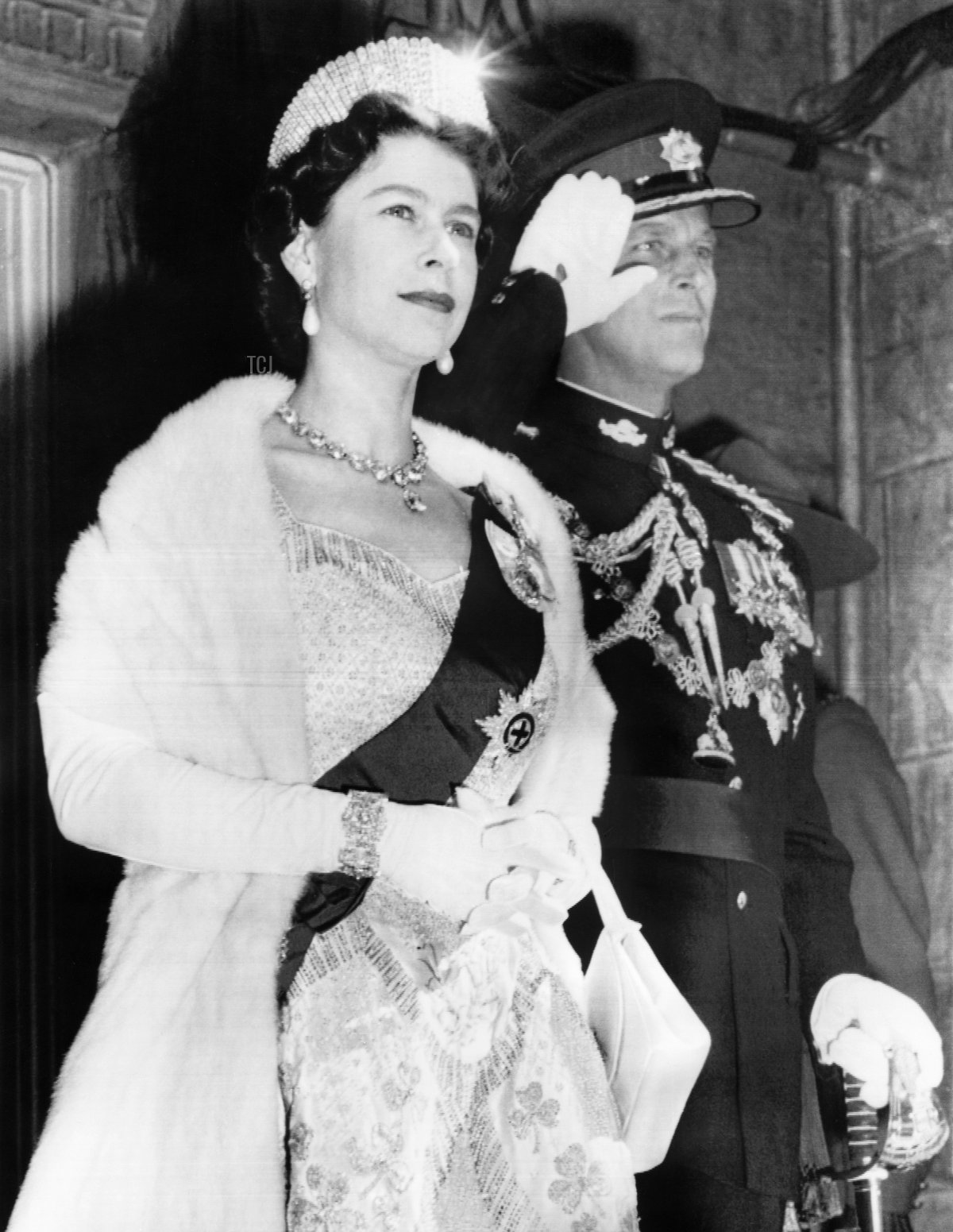 Britain's Queen Elizabeth II and Prince Philip, Duke of Edinburgh (R) attend the ceremonies marking the opening of Parliament in Ottawa on October 14, 1957