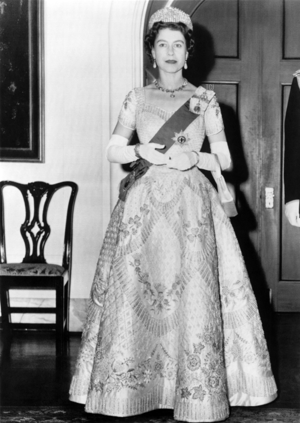 Queen Elizabeth II poses at the Government house before attending the ceremonies marking the opening of Parliament in Ottawa on October 14, 1957 during a state visit in Canada