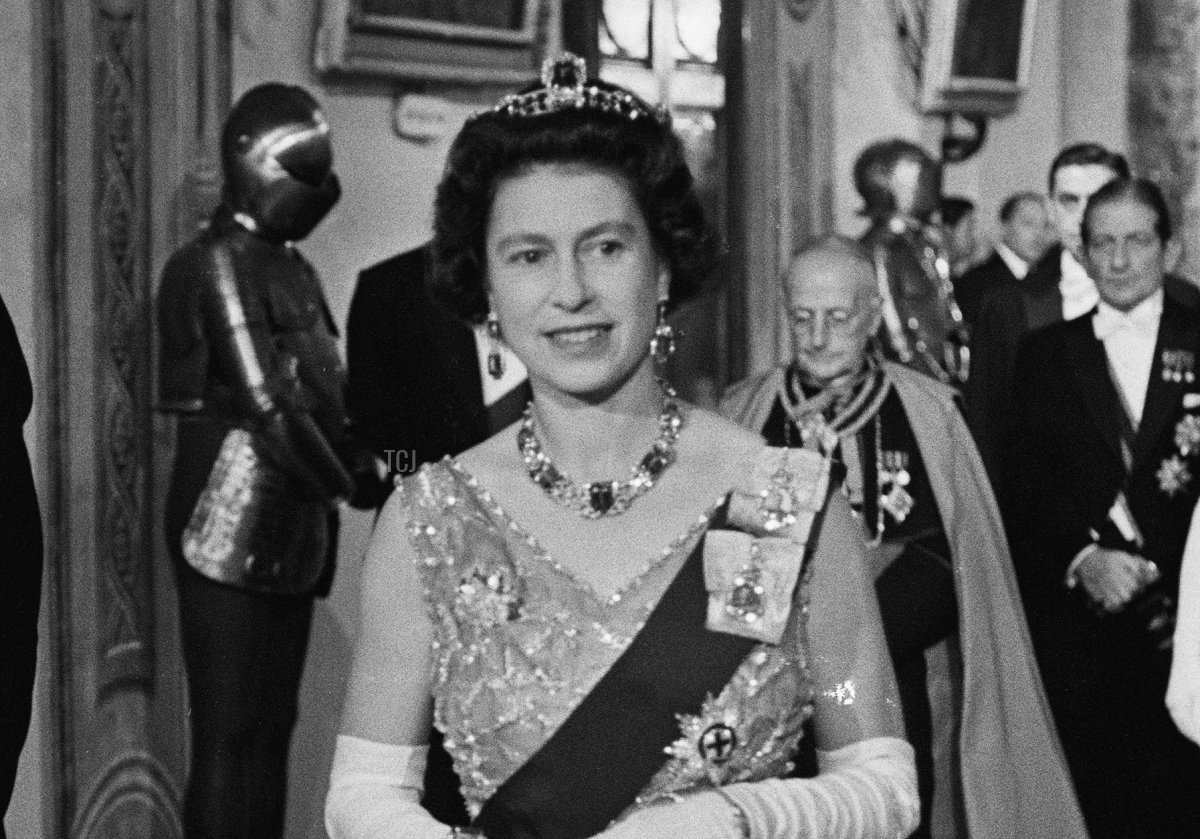 Queen Elizabeth II attends a banquet during a Commonwealth visit to Malta, accompanied by Maurice Henry Dorman (1912 - 1993), the Governor-General of Malta, 14th November 1967