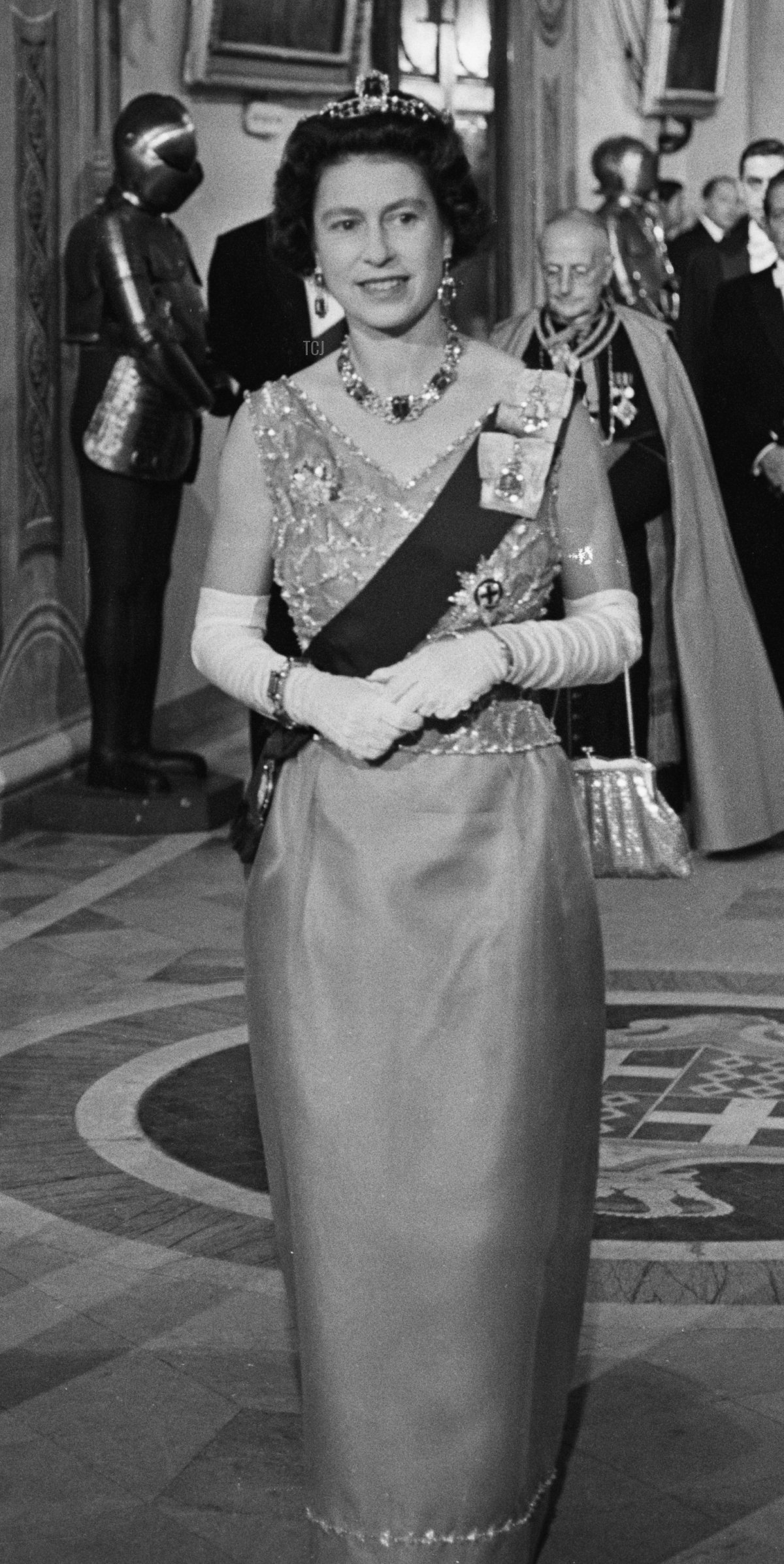 Queen Elizabeth II attends a banquet during a Commonwealth visit to Malta, accompanied by Maurice Henry Dorman (1912 - 1993), the Governor-General of Malta, 14th November 1967