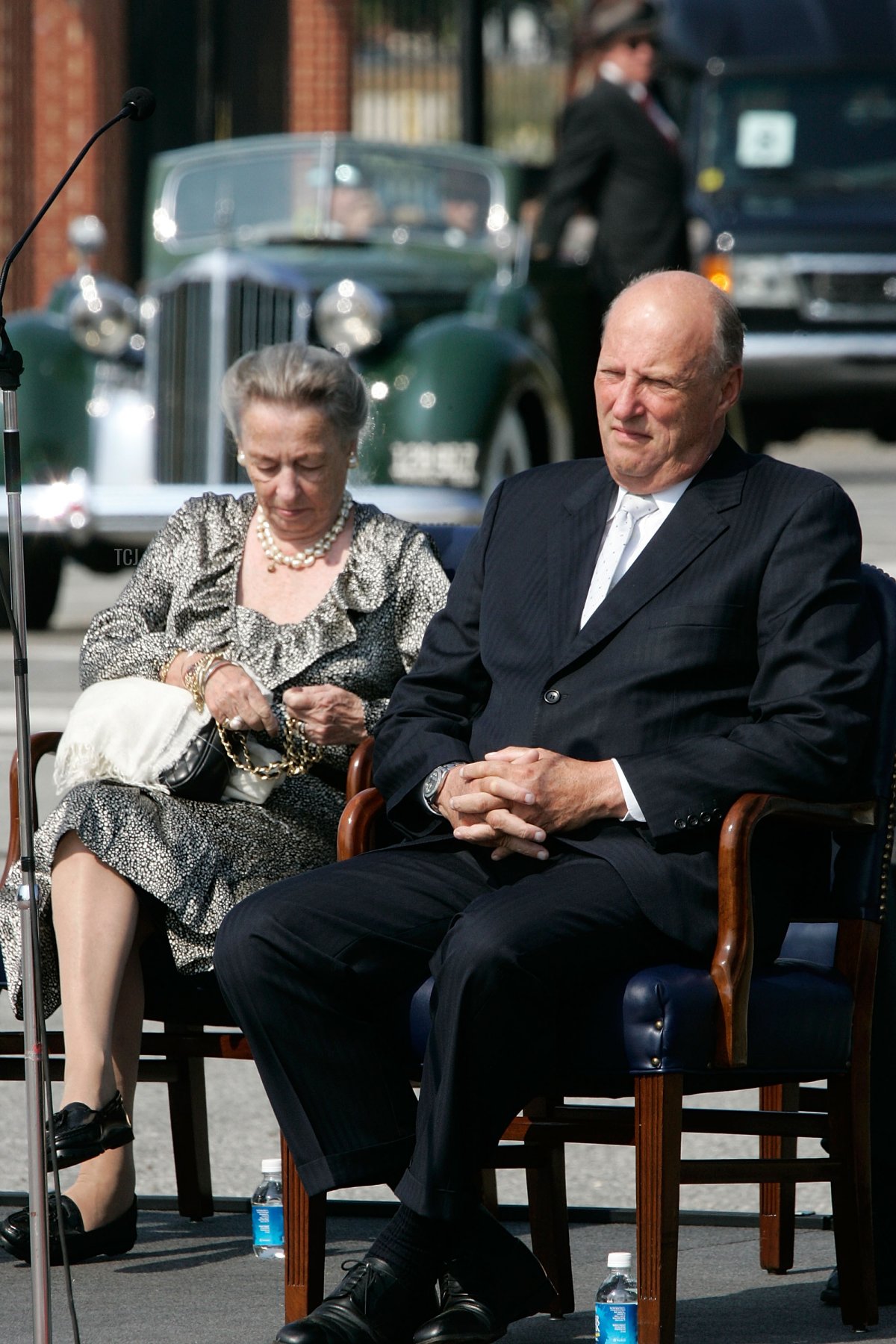 King Harald V (R) and Princess Ragnhild (L) of Norway attend an reenactment of the 1942 ceremony in which the U.S. handed over a ship to the Royal Norwegian Navy at Washington Navy Yard September 19, 2005 in Washington, DC