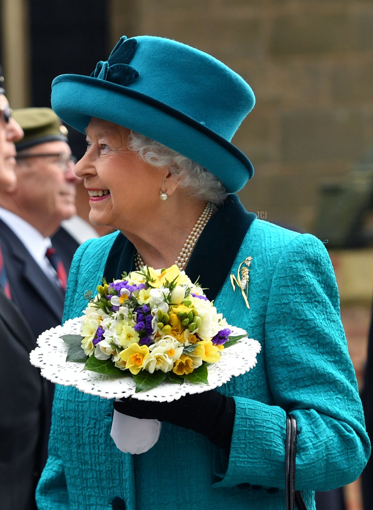 Britain's Queen Elizabeth II meets former servicemen following the Royal Maundy service at Leicester Cathedral on April 13, 2017 in Leicester