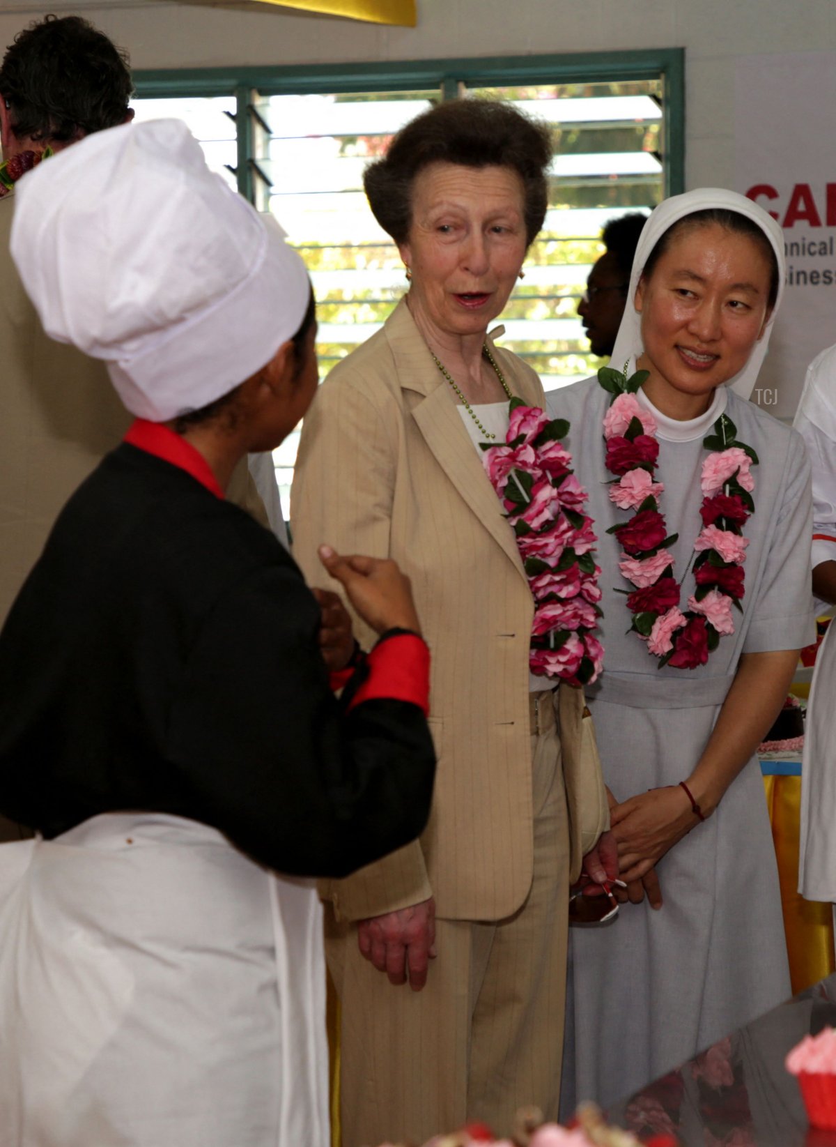 Britain's Princess Anne (2R) visits a school in Port Moresby on April 12, 2022, during her royal trip to Papua New Guinea in celebration of the Queen's Platinum Jubilee