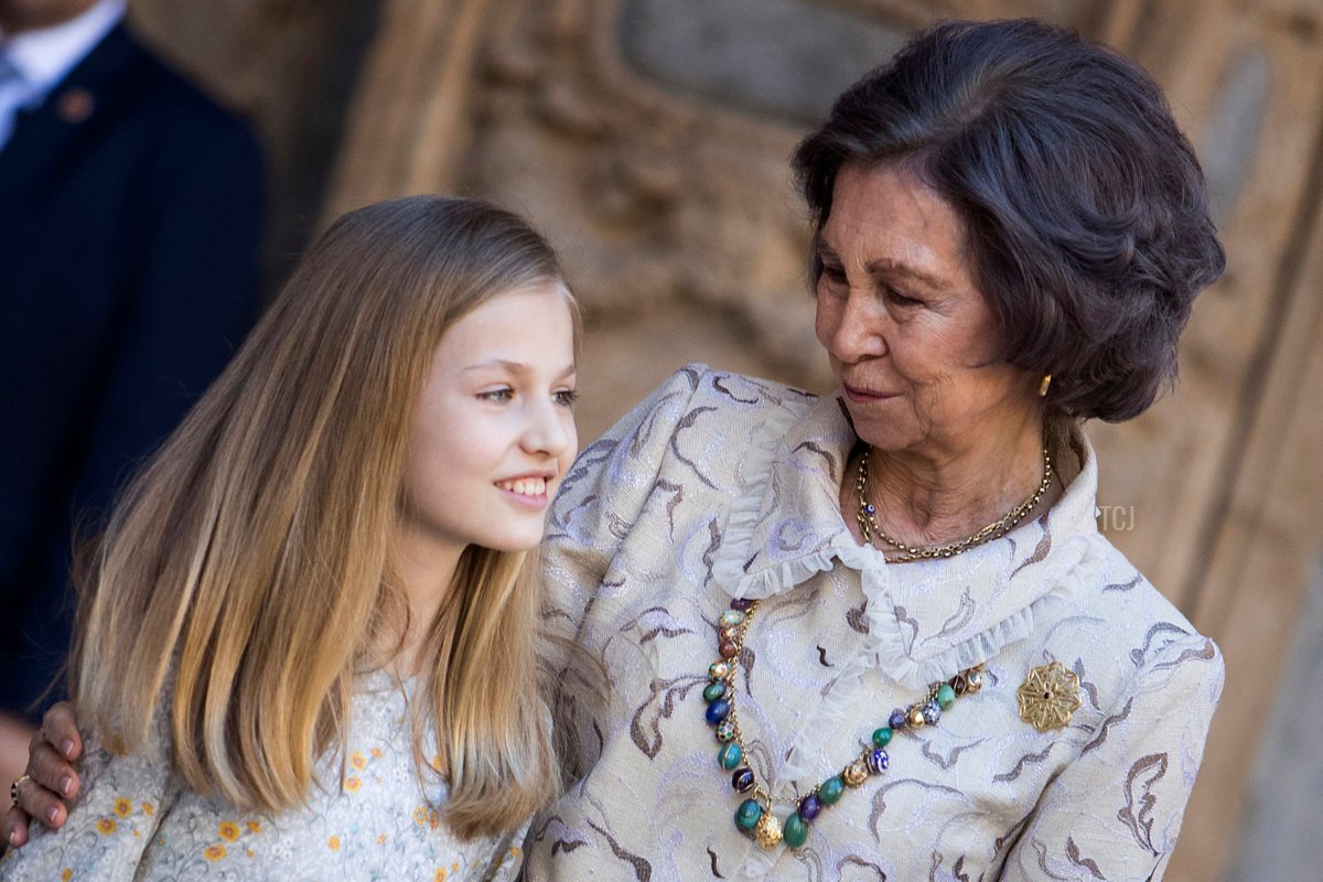 Princess Leonor of Spain (L) stands with her grandmother former Queen Sofia after attending the traditional Easter Sunday Mass of Resurrection in Palma de Mallorca on April 1, 2018