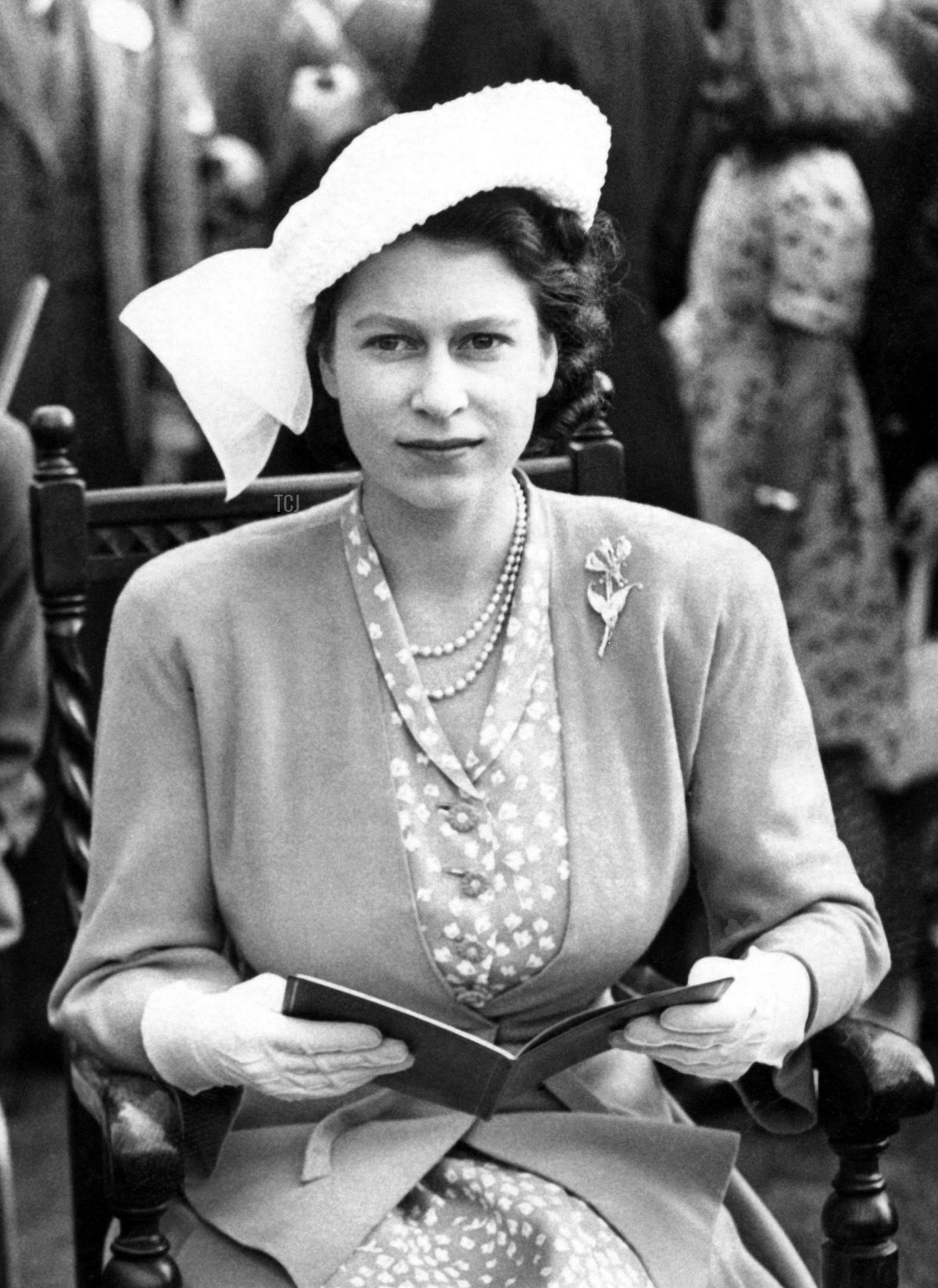 Princess Elizabeth II and Prince Philip, Duke of Edinburgh attend the Metropolitan Police Horse show in London on June 25, 1948