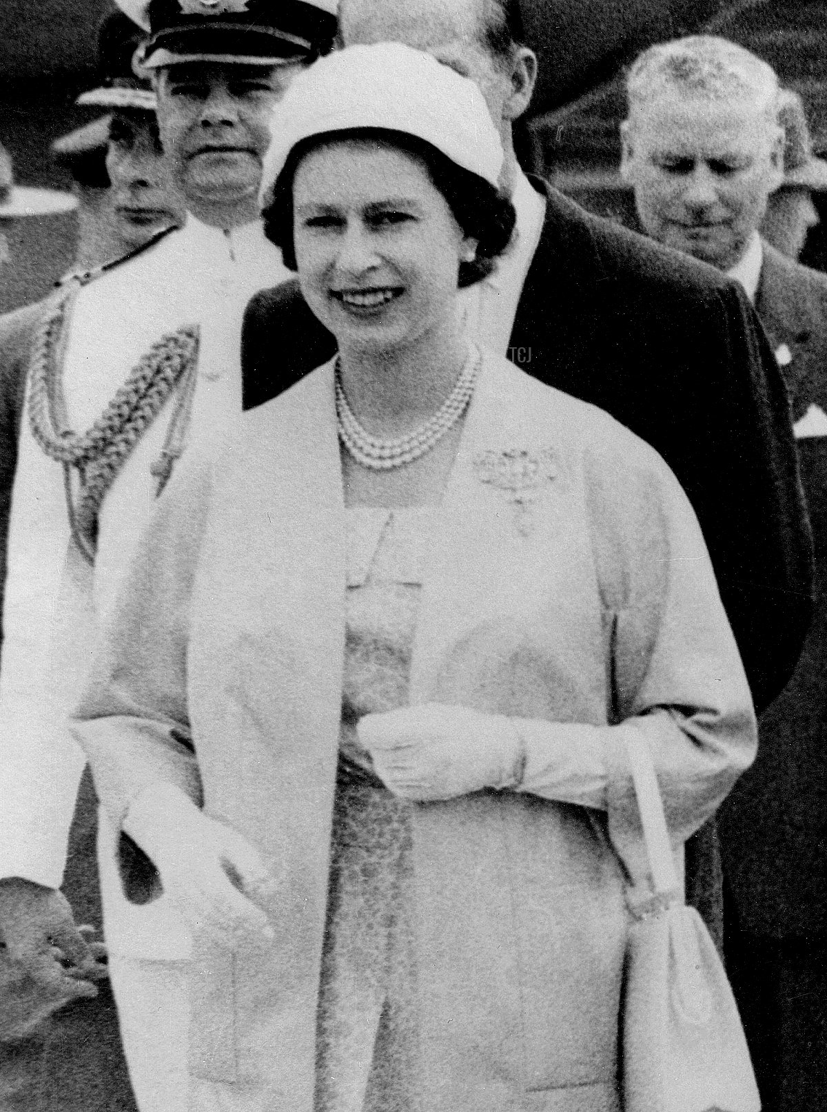 The Queen Elizabeth and President Dwight D. Eisenhower leaving the airstrip at St.Hubert, Quebec, where her Majesty greeted the President and his wife on their arrival in Canada on June 29, 1959
