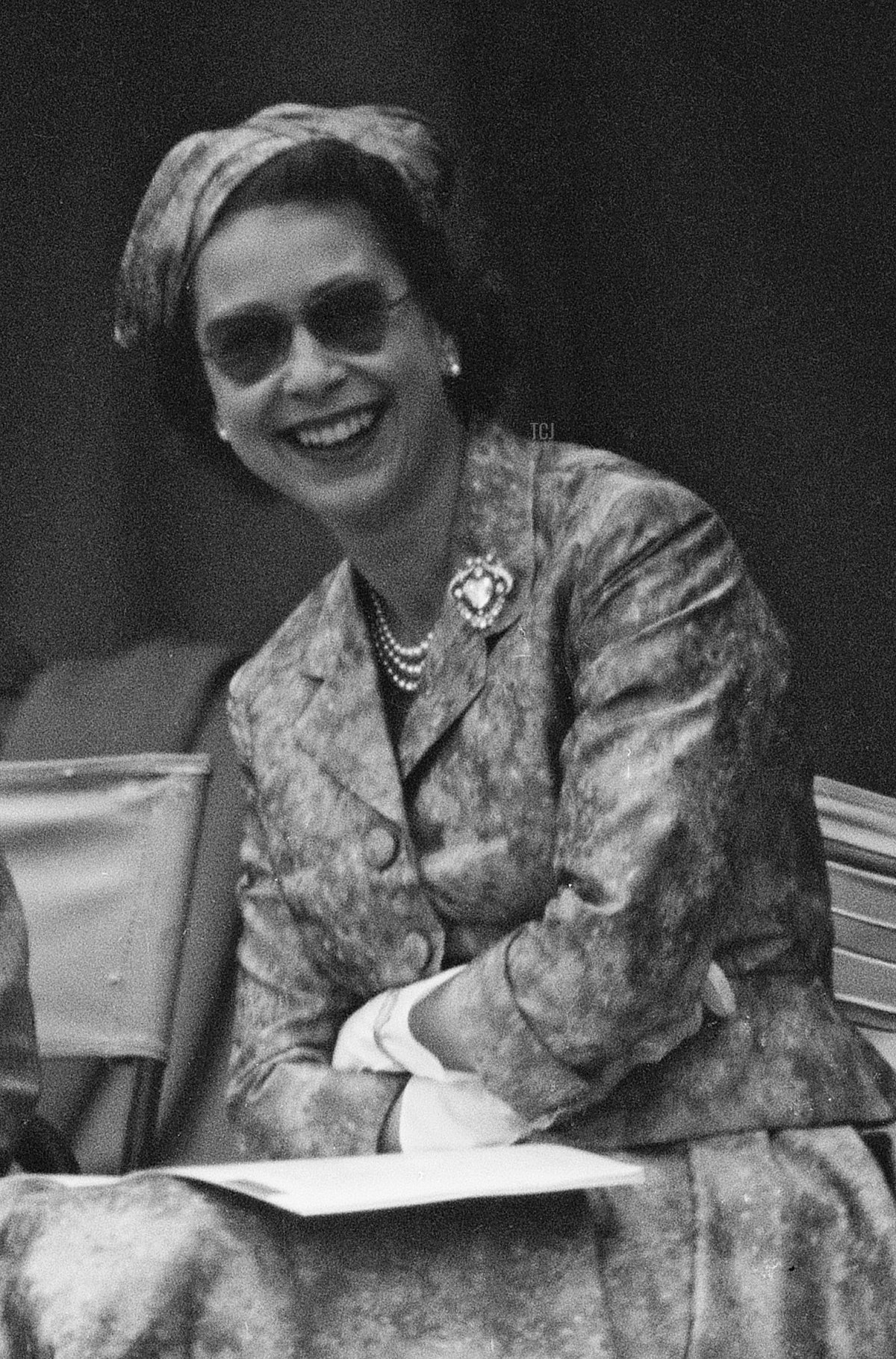 Queen Elizabeth II watching Prince Philip, Duke of Edinburgh during a cricket match at Highclere Castle, Highclere, Hampshire, 3rd August 1958