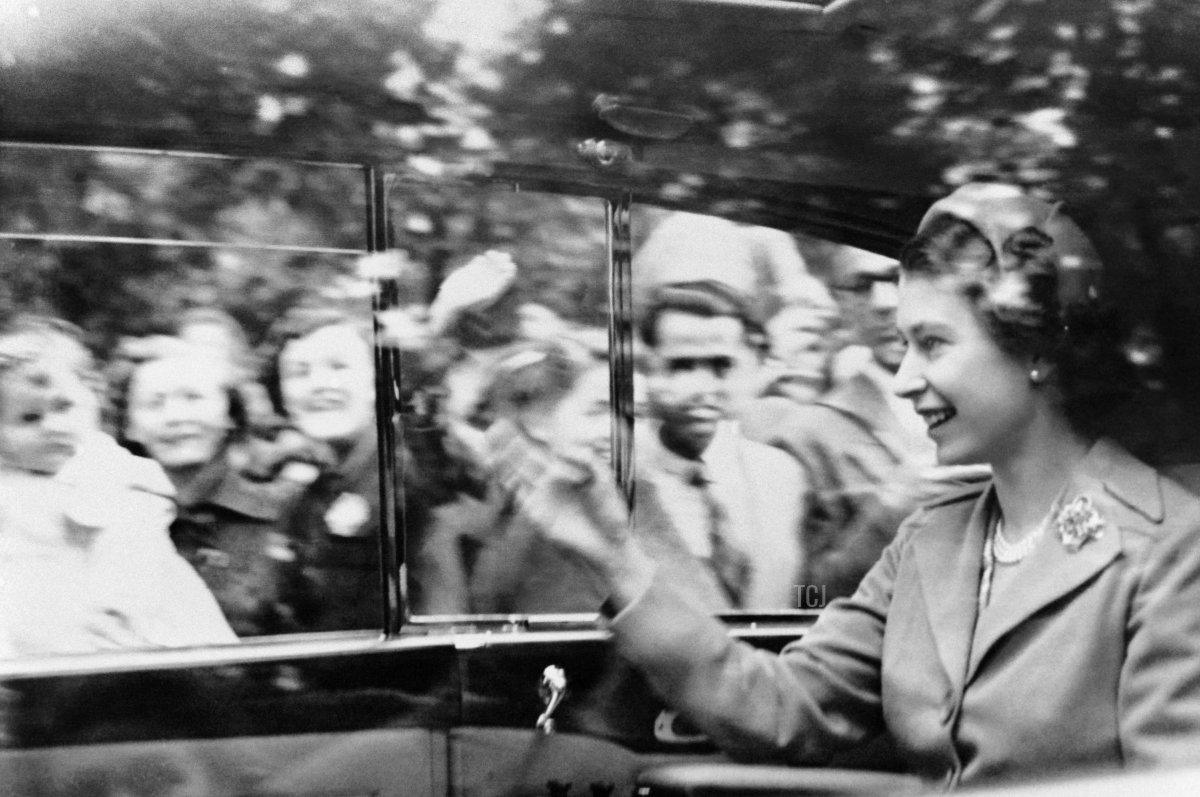 Princess Elizabeth of York, future Queen Elizabeth II, waves to the crowd at the eve of her coronation, on May 31, 1953 in London