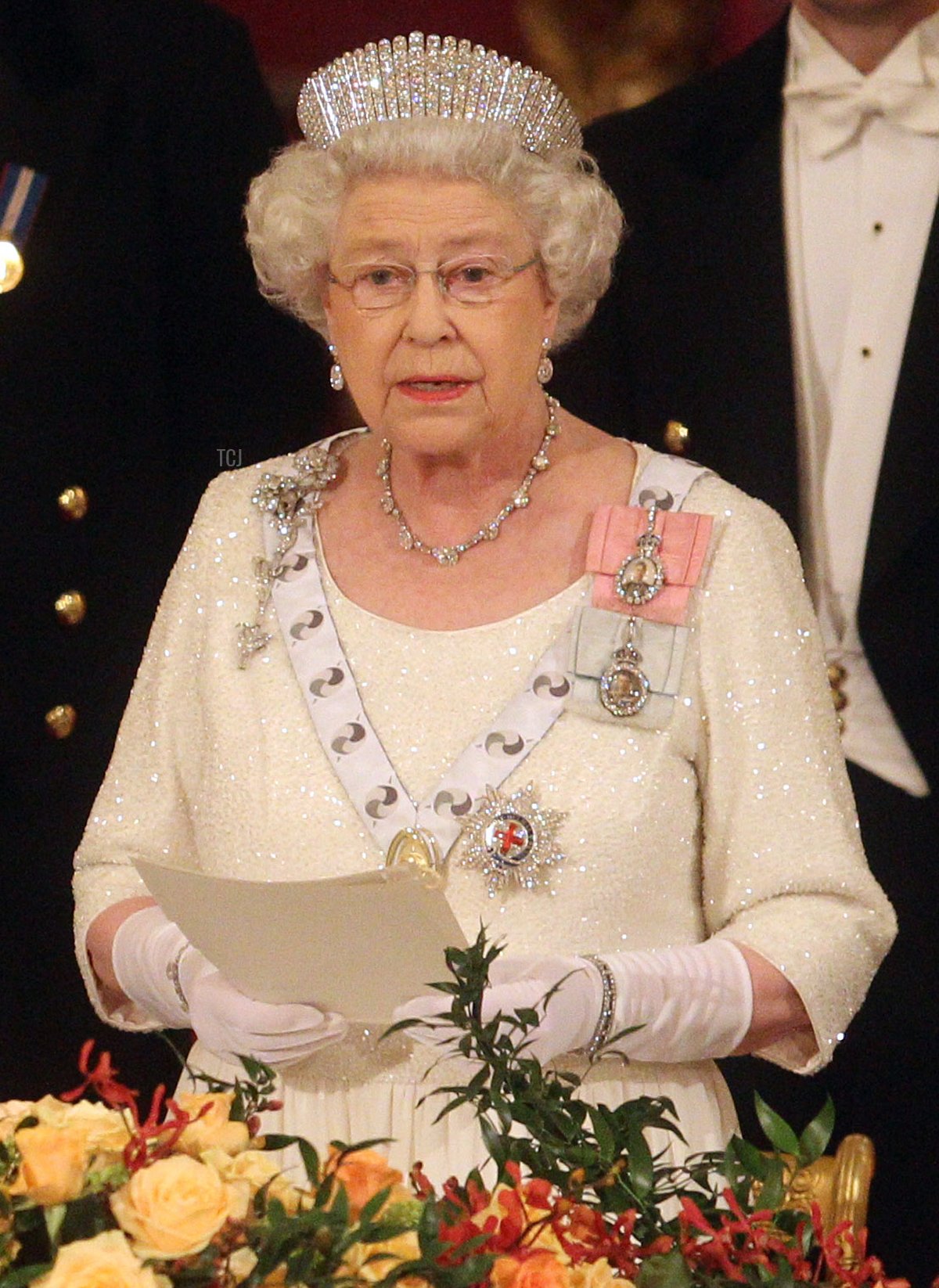 Britain's Queen Elizabeth II (R) delivers a speech as President of South Africa Jacob Zuma (L) listens at the start of the State Banquet in Buckingham Palace in London on March 3, 2010