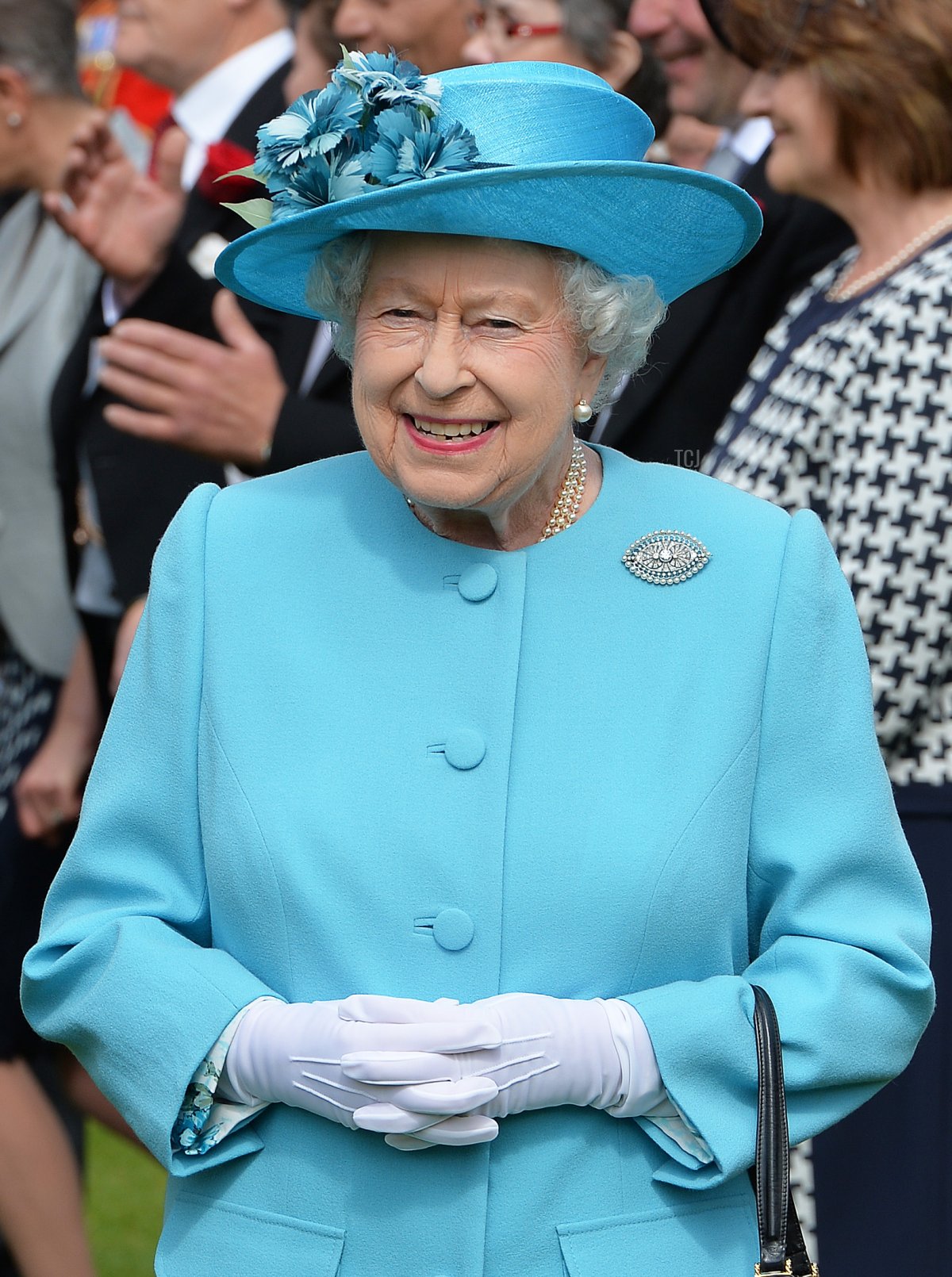 Queen Elizabeth II attends a garden party at Buckingham Palace on May 24, 2016 in London, England