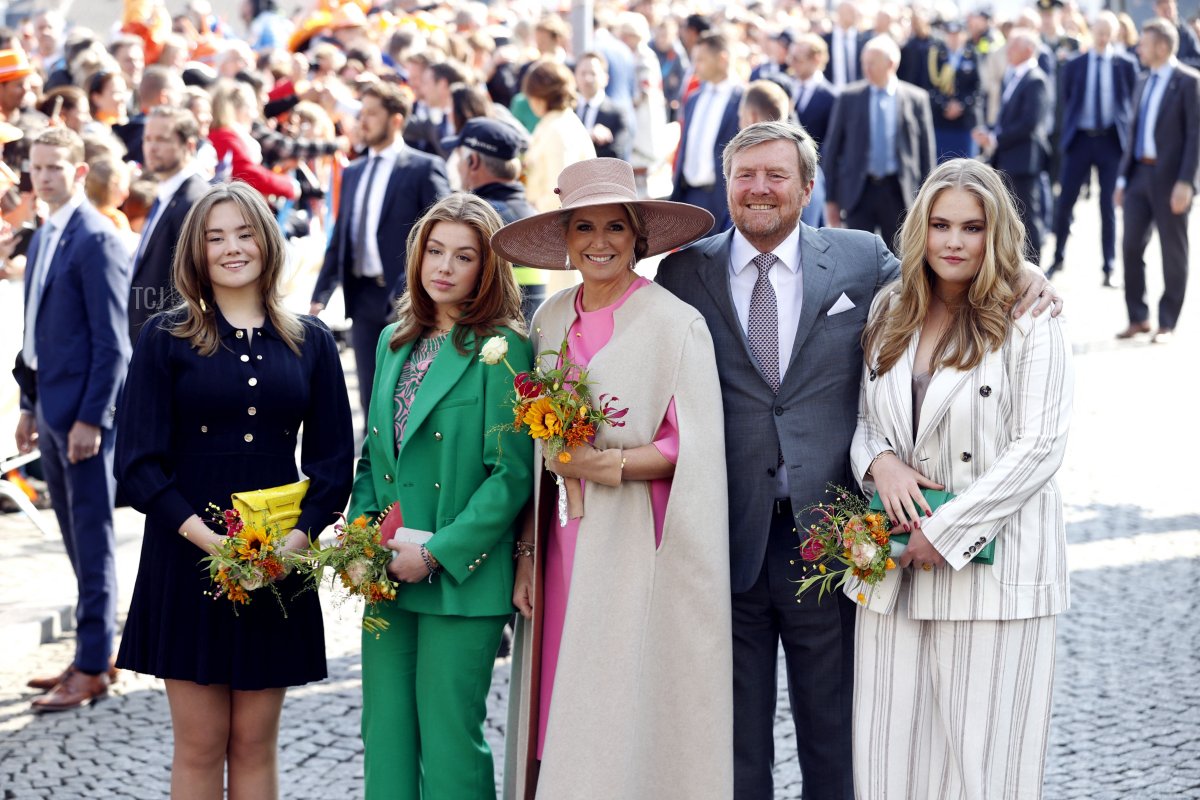 King Willem-Alexander (2nd R) of the Netherlands, Queen Maxima (C) and princesses Ariane (L), Alexia (2nd L) and Amalia (R) attend a gathering for King's Day in Maastricht, on April 27, 2022