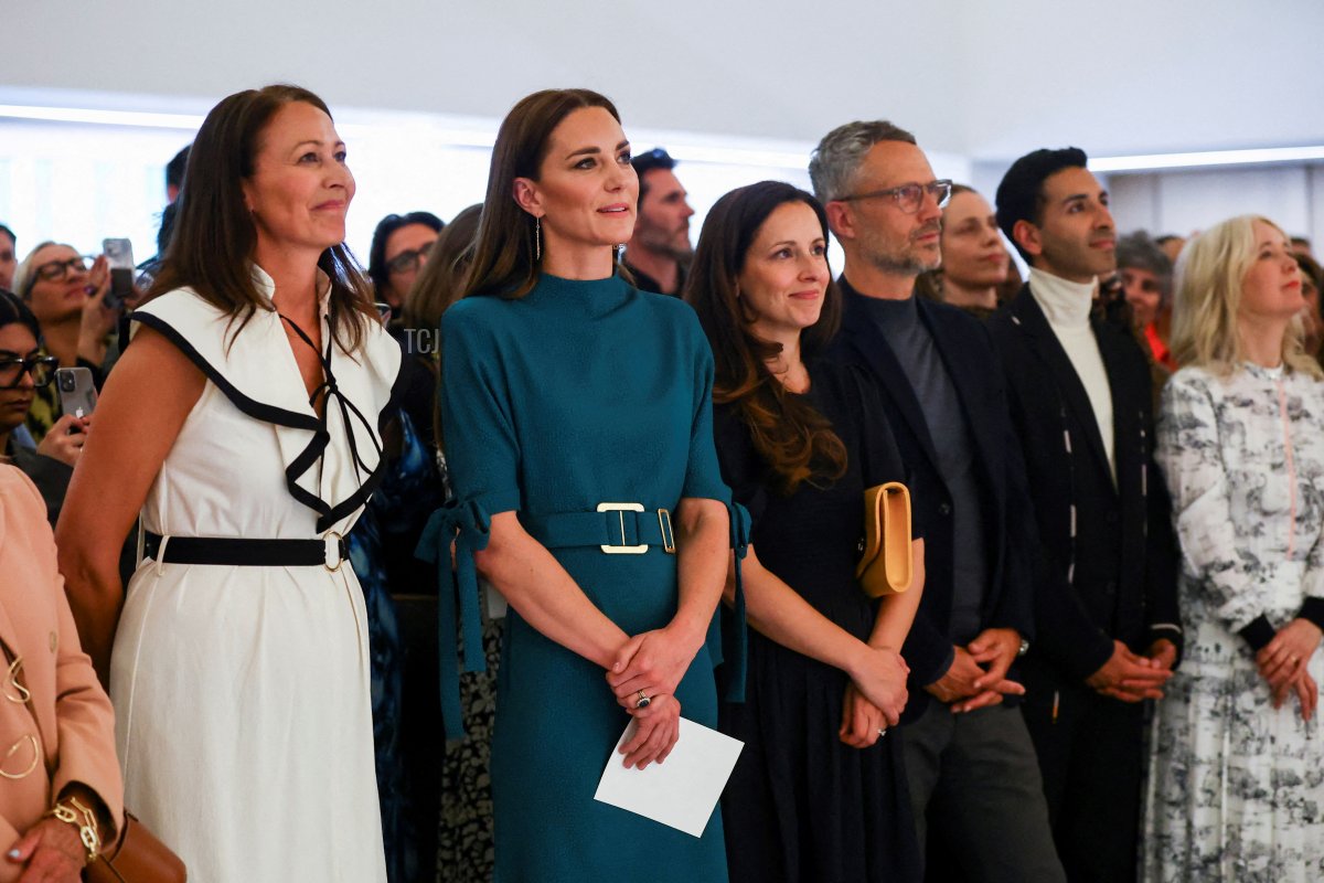 Britain's Catherine, Duchess of Cambridge, and CEO of the British Fashion Council (BFC), Caroline Rush, stand in the audience and listen to people speak during "The Queen Elizabeth II Award for British Design" ceremony at the Londons Design Museum, on May 4, 2022