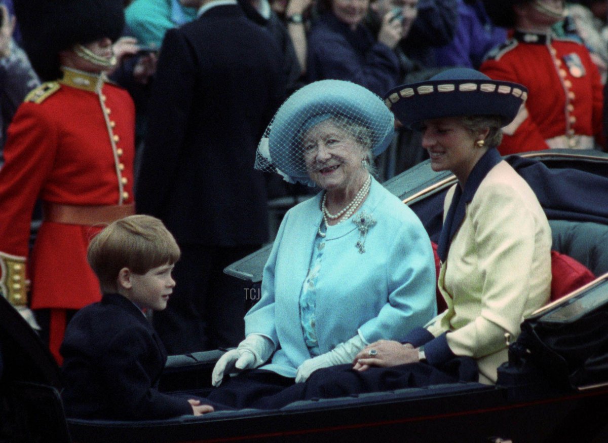 The Queen Mother, accompanied by the Princess of Wales and her six-year-old son, Prince Harry, ride during the Trooping the Colour ceremony on June 15, 1991 (Jonathan Bainbridge/Reuters/Alamy)