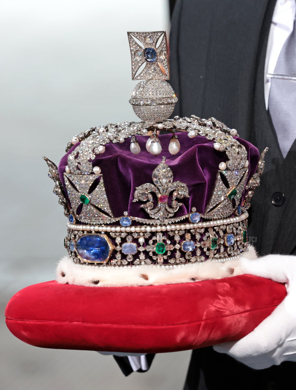 The Imperial State Crown arrives through the Sovereign's Entrance ahead of the State Opening of Parliament at Houses of Parliament on May 10, 2022 in London, England