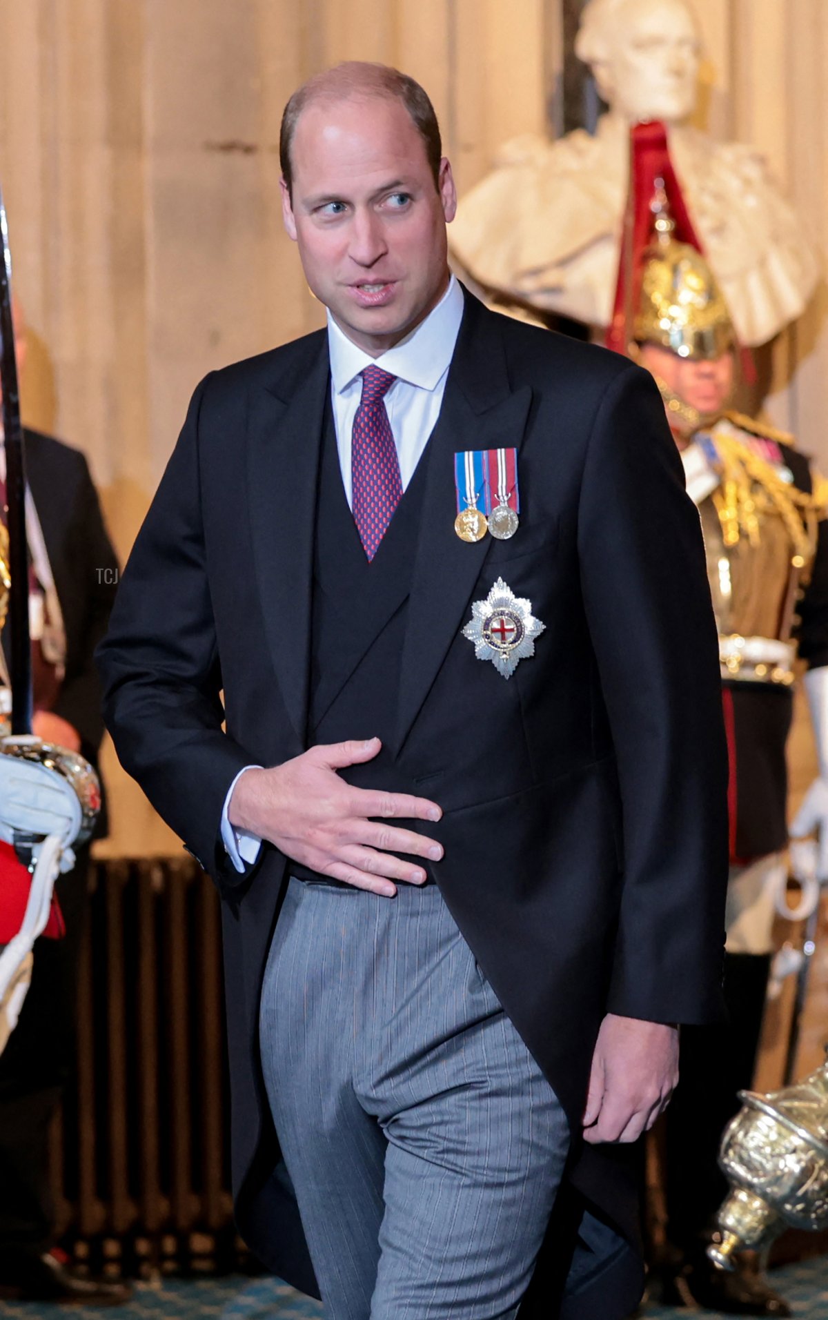 Britain's Prince William, Duke of Cambridge departs through the Sovereign's Entrance after attending the State Opening of Parliament at the Houses of Parliament, in London, on May 10, 2022