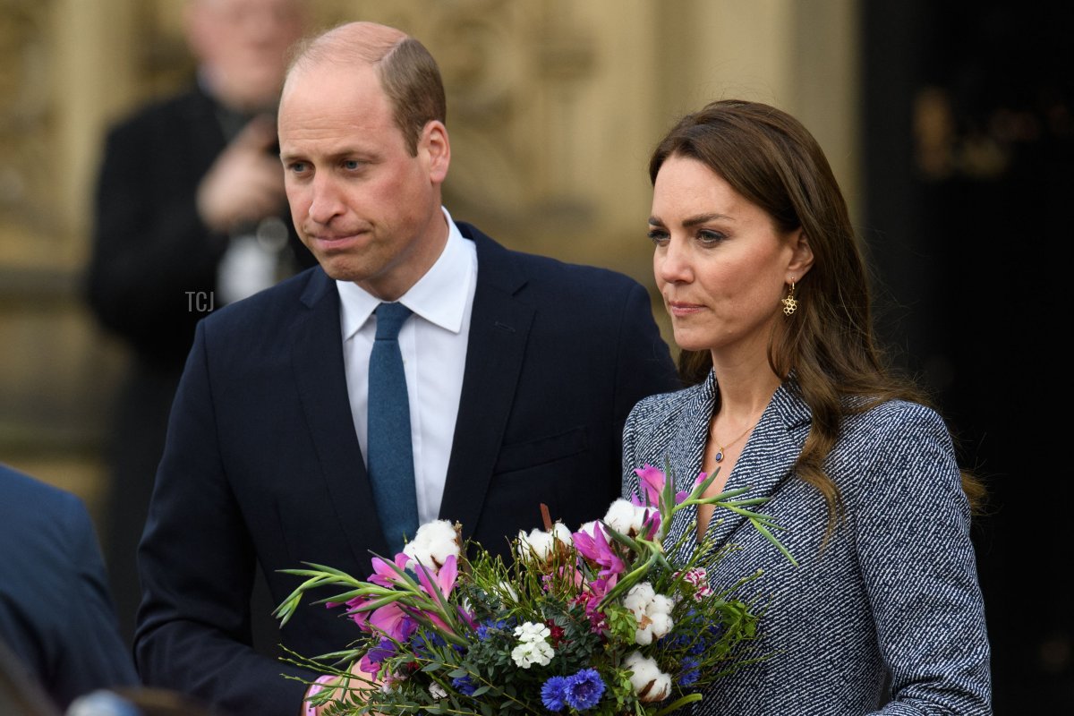 Britain's Prince William, Duke of Cambridge (L) and Britain's Catherine, Duchess of Cambridge (R) leave after attending the official opening of the Glade of Light memorial in Manchester, north-west England on May 10, 2022