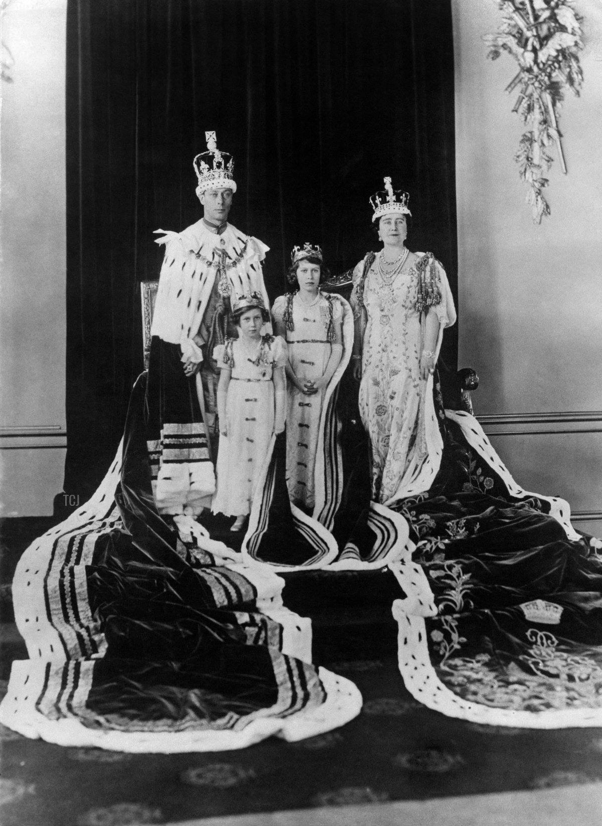 Queen Elizabeth Bowes-Lyon, the former Duchess of York (R), the King George VI, and their daughters Princess Elizabeth (C) and Princess Margaret pose on May 12, 1937 in London after the Coronation of Duke of York