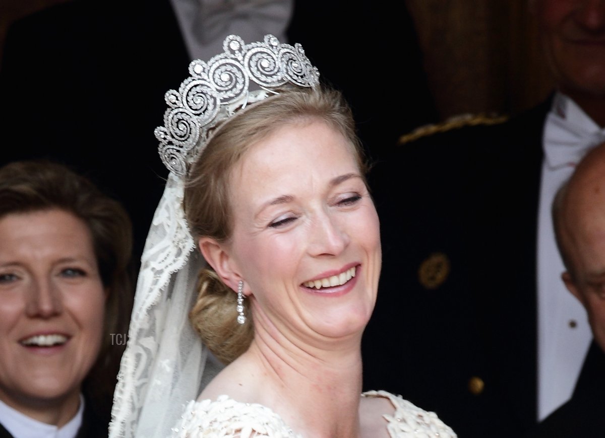 Princess Nathalie zu Sayn-Wittgenstein-Berleburg waits for her bridal bouquet prior to her wedding to Alexander Johannsmann at the evangelic Stadtkirche on June 18, 2011 in Bad Berleburg, Germany