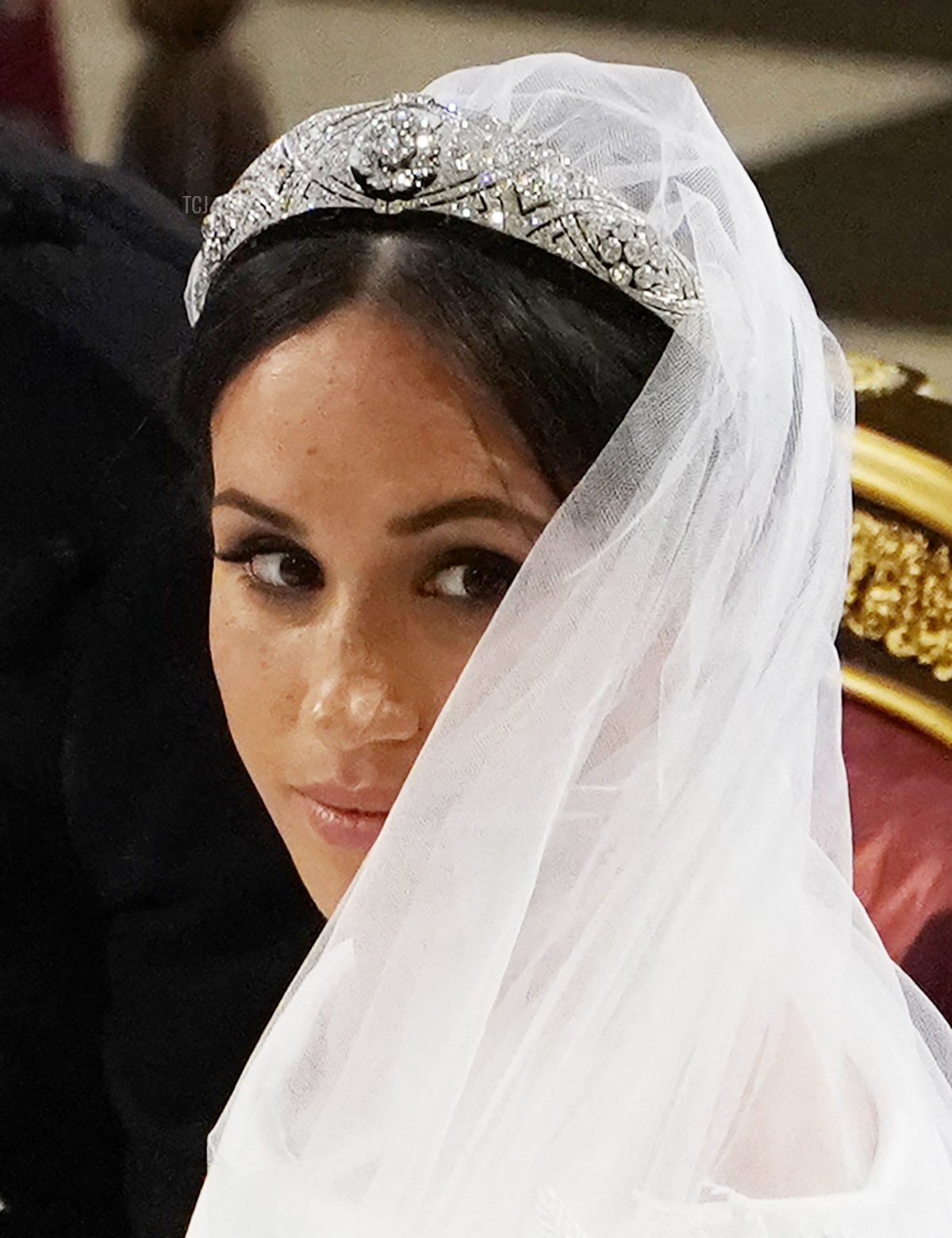 US actress Meghan Markle stands st the altar with her future husband Britain's Prince Harry, Duke of Sussex (unseen) at the altar in St George's Chapel, Windsor Castle, in Windsor, on May 19, 2018 during their wedding ceremony