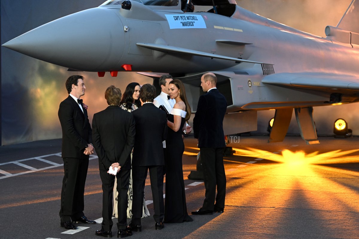 Britain's Catherine, Duchess of Cambridge, (2nd R) and Britain's Prince William, Duke of Cambridge (R), meet with US actor Tom Cruise (C) and other actors on the red carpet upon arrival for the UK premiere of the film "Top Gun: Maverick" at the Leicester Square Gardens, in London, on May 19, 2022