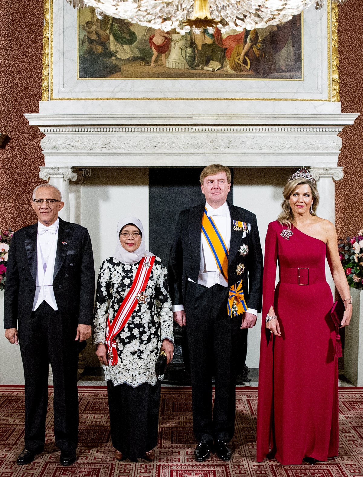 King Willem-Alexander of The Netherlands and Queen Maxima of The Netherlands pose for an official picture with Halimah Yacob President of Singapore and her husband Mohamed Abdullah Alhabshee during an official state banquet at Royal Palace Amsterdam on November 21, 2018 in Amsterdam, Netherlands