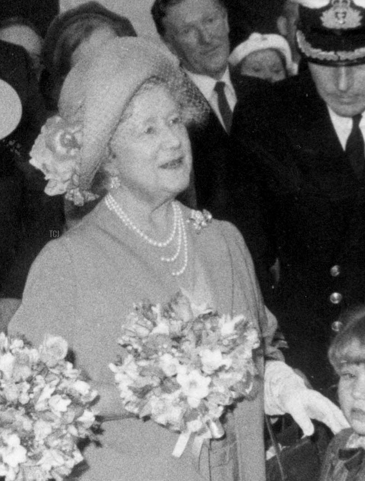 The Queen Mother chats to crew members aboard the HMS Ark Royal, 1984