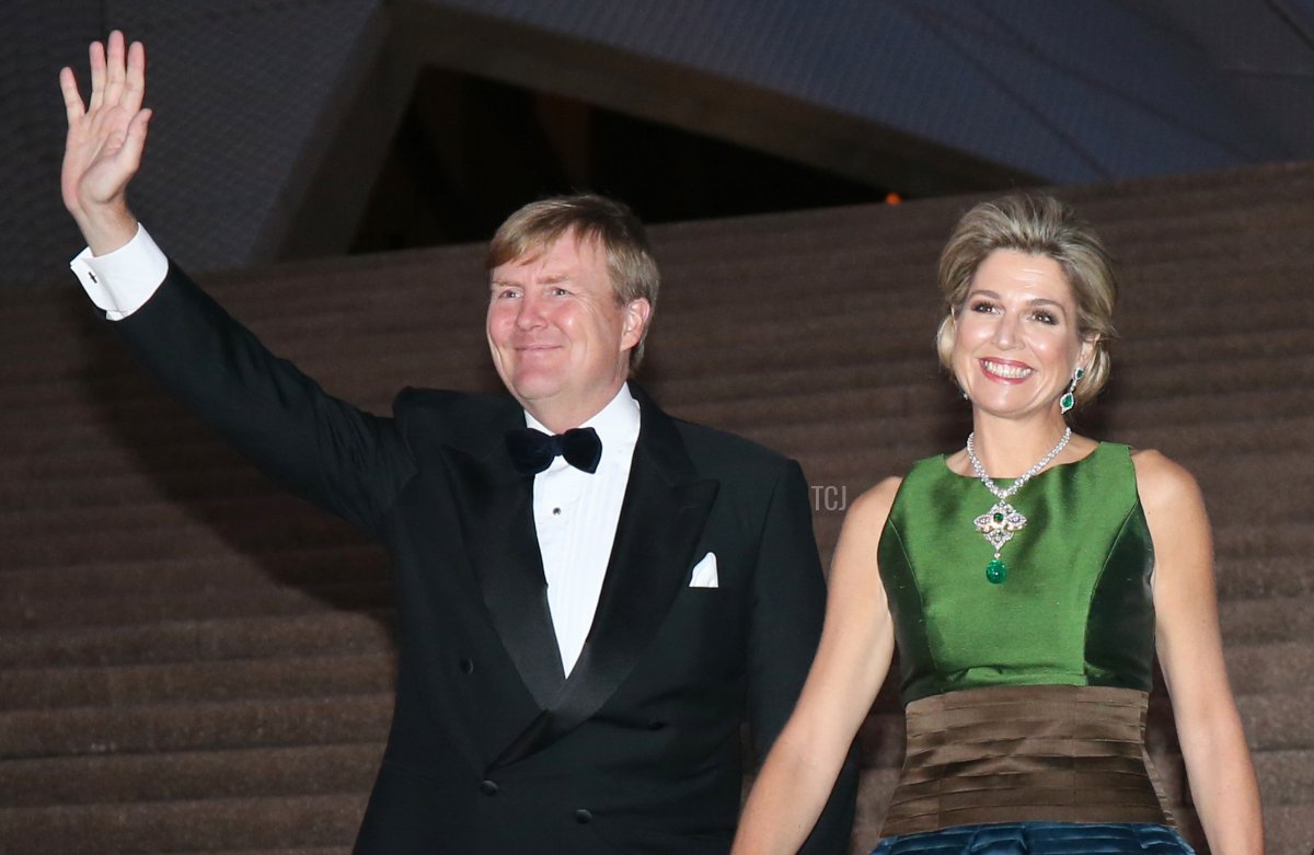 King Willem-Alexander (L) and Queen Maxima (R) of the Netherlands pose for a photograph as they arrive for a concert at the Sydney Opera House in Sydney, on November 2, 2016
