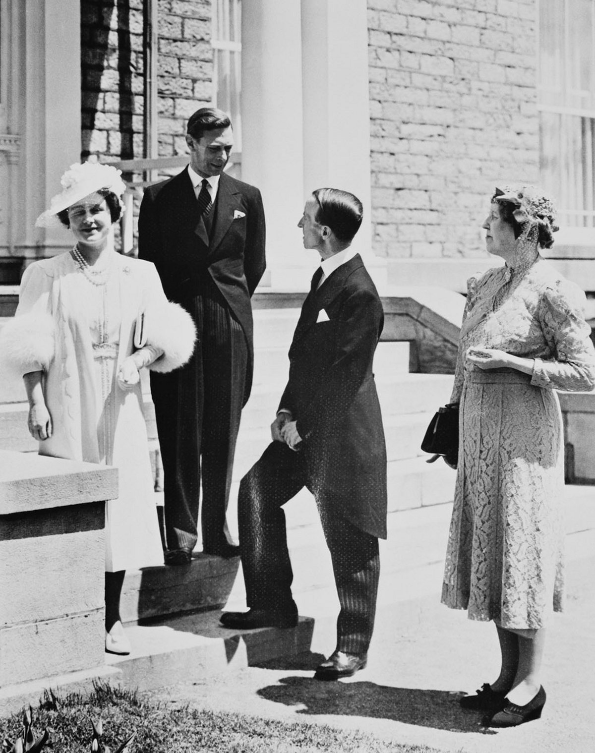 Queen Elizabeth (left) King George VI (second from left) with Governor General Lord Tweedsmuir (second from right) and Lady Tweedsmuir (right) at Rideau Hall during Their Majesties' royal tour of Canada, 20 May 1939