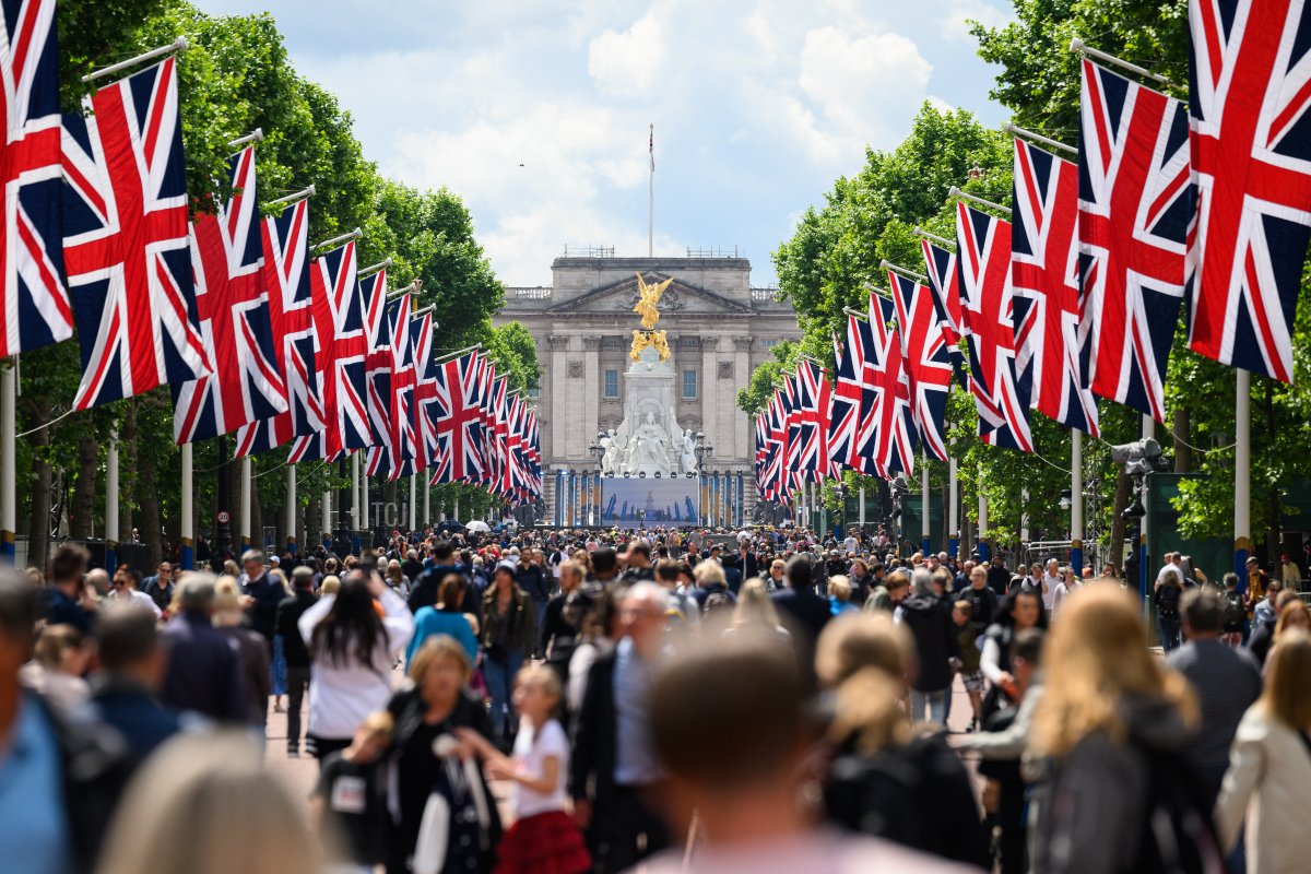 Members of the public walk along the Mall ahead of the upcoming Jubilee events, on June 01, 2022 in London, England