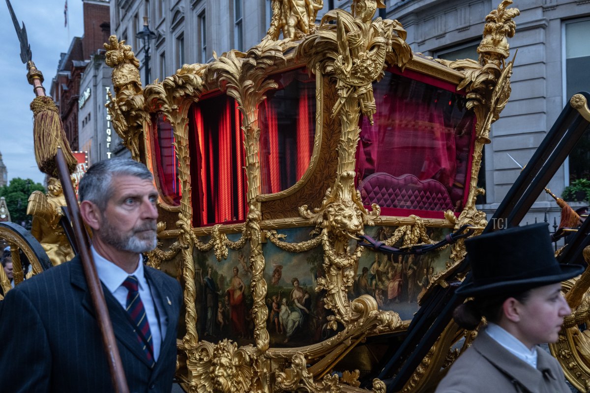 The Gold State Coach which carried HM Queen Elizabeth II at her Coronation is seen here featuring digitally displayed illuminated curtains during a rehearsal for the Queen's Platinum Jubilee pageant, on May 31, 2022 in London, England