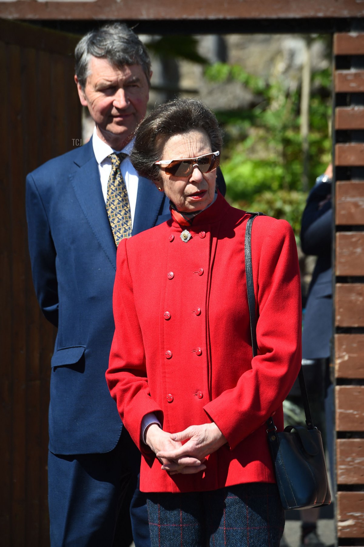 Britain's Princess Anne, Princess Royal (R) and her husband Vice Admiral Timothy Laurence visit the Penguin Enclosure at Edinburgh zoo in Scotland on June 3, 2022 as part of the royal family's tour for Queen Elizabeth II's platinum jubilee celebrations