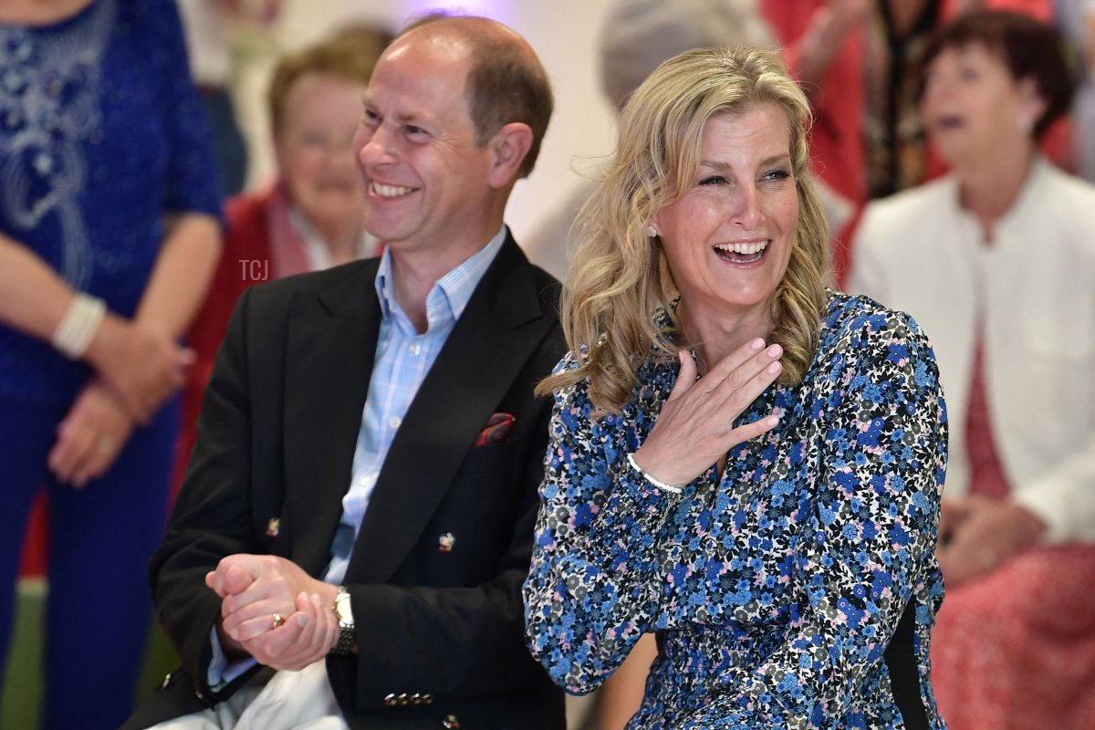 Britain's Prince Edward, Earl of Wessex, and Britain's Sophie, Countess of Wessex, react during a performance in Belfast in Northern Ireland on June 4, 2022 as part of the royal family's tour for Queen Elizabeth II's platinum jubilee celebrations