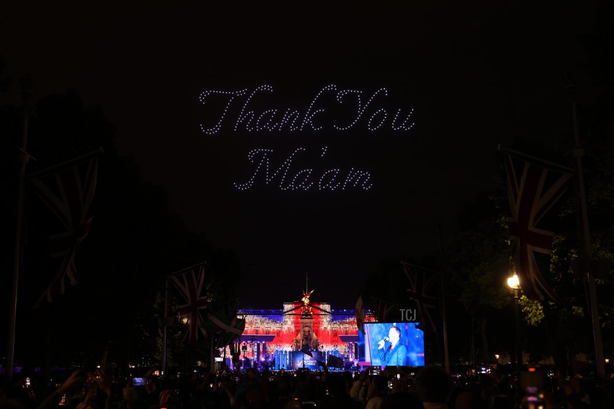 Drones form messages of celebration over the crowds during the Platinum Party At The Palace concert outside Buckingham Palace on June 4, 2022 in London, United Kingdom