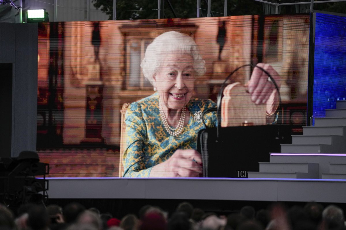 Queen Elizabeth II is seen onscreen during the Platinum Party At The Palace at Buckingham Palace on June 4, 2022 in London, England