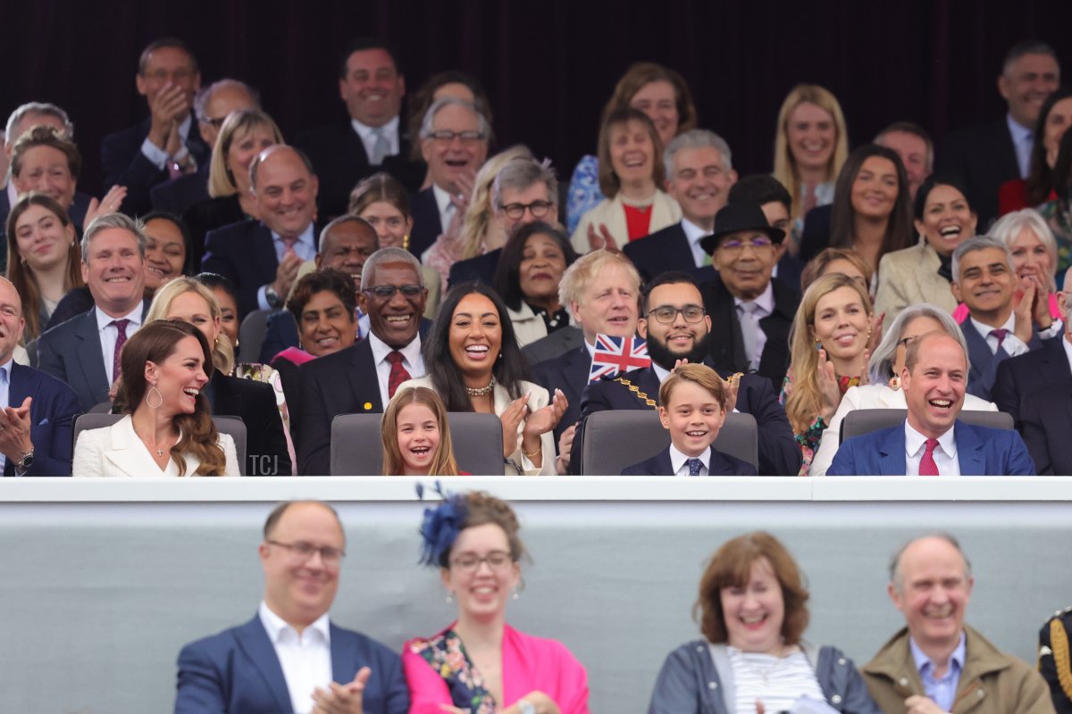 Catherine, Duchess of Cambridge, Princess Charlotte of Cambridge, Prince George of Cambridge and Prince William, Duke of Cambridge during the Platinum Party at the Palace in front of Buckingham Palace on June 04, 2022 in London, England