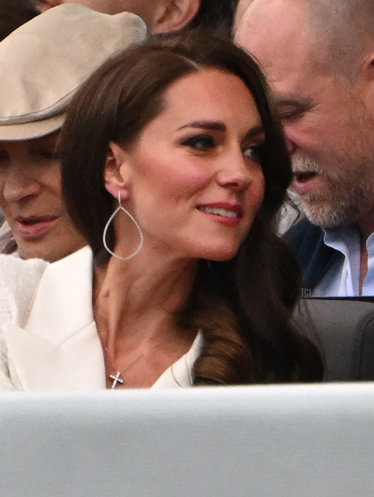 Britain's Catherine, Duchess of Cambridge, (L) and Britain's Princess Charlotte of Cambridge (R) react during the Platinum Party at Buckingham Palace on June 4, 2022 as part of Queen Elizabeth II's platinum jubilee celebrations